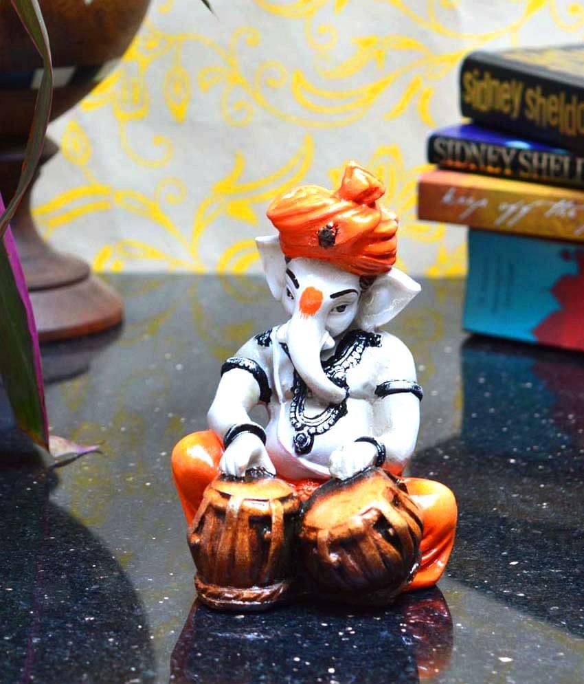 eCraftIndia White & Orange-Coloured Textured Lord Ganesha Playing Tabla Showpiece eCraftIndia White & Orange-Coloured Textured Lord Ganesha Playing Tabla Showpiece