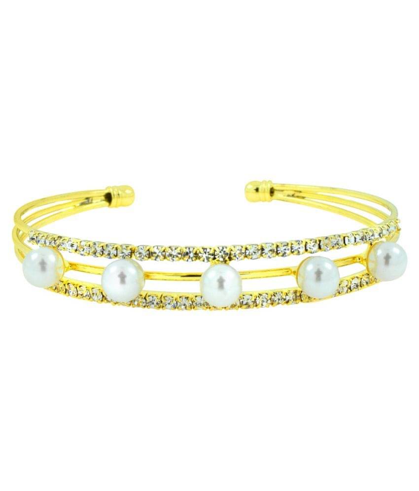 The Jewelbox Brass Gold Plating Studded Gold Coloured Cuff     			The Jewelbox Brass Gold Plating Studded Gold Coloured Cuff