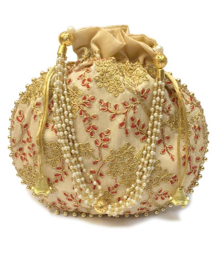     			Apratim Beige Silk Potli