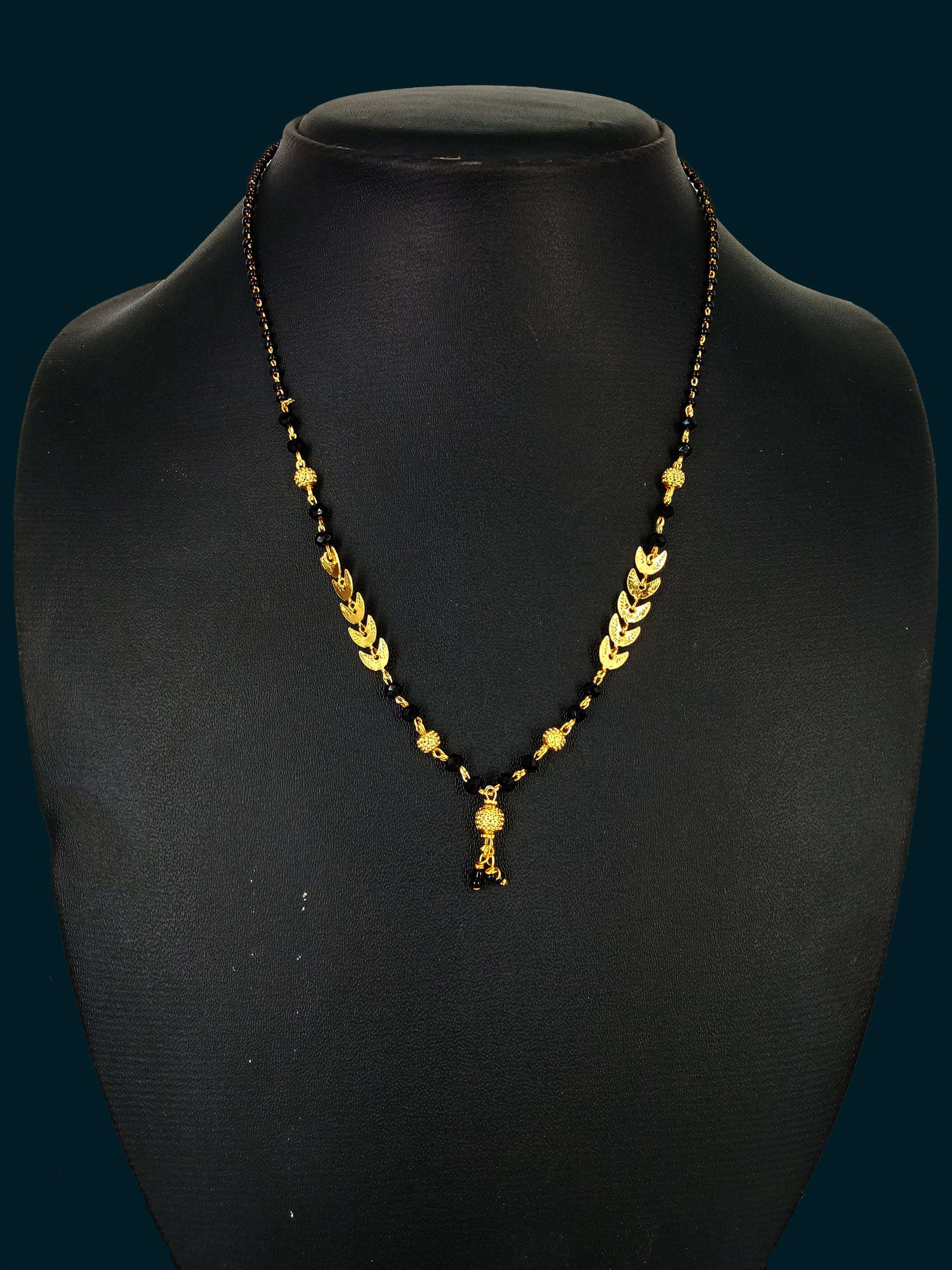     			H M PRODUCT Golden Mangalsutra ( Pack of 1 )