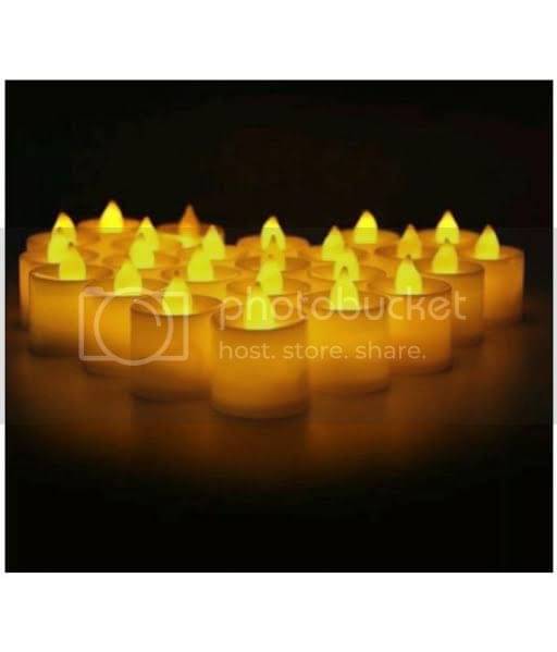 thrifkart The flickering bulb flameless LED candles LED Candle Yellow - Pack of 12 thrifkart The flickering bulb flameless LED candles LED Candle Yellow - Pack of 12
