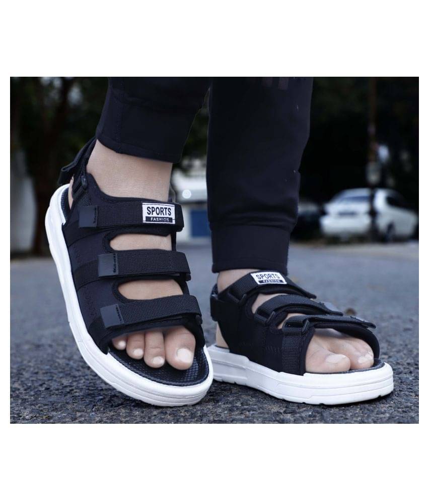     			Aadi Black Mesh/Textile Sandals