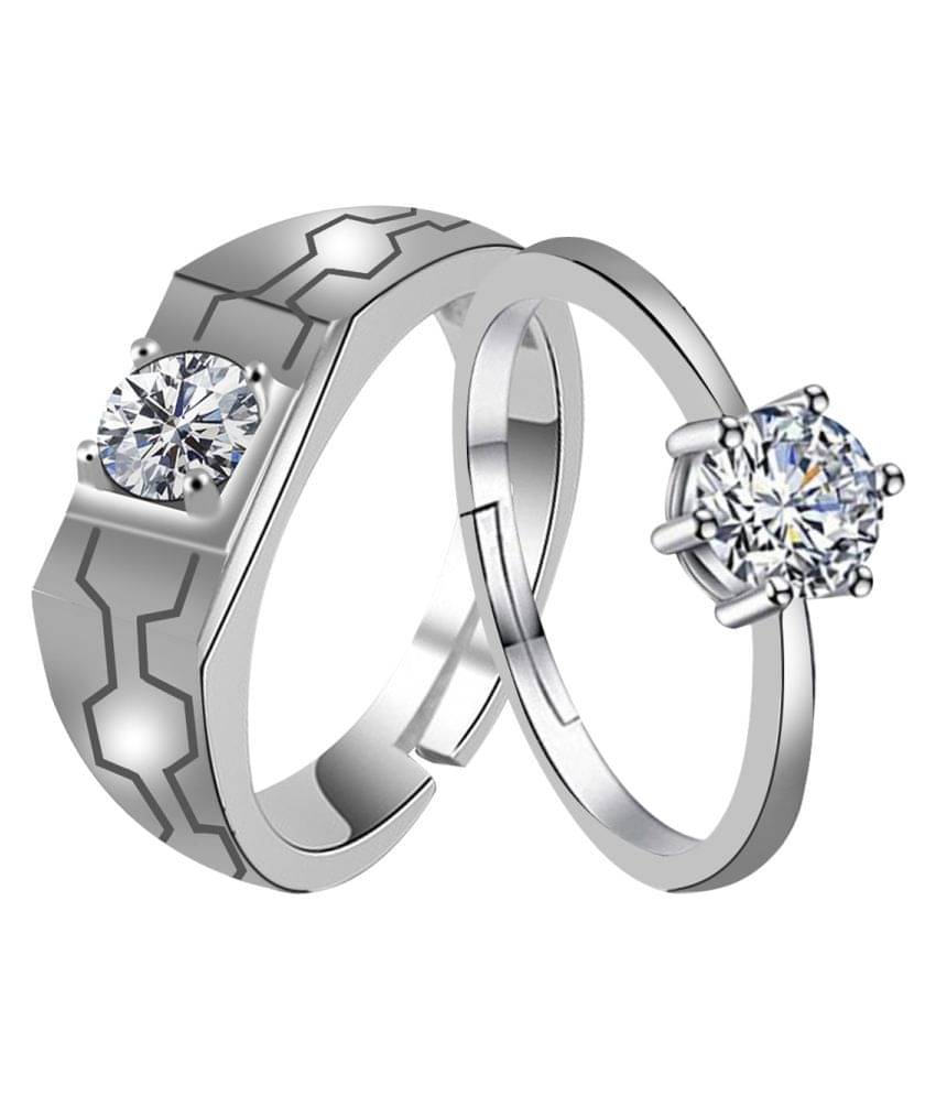 silver plated round shiny one diamond and carving with sharp look designer adjustable couple ring for men and women. silver plated round shiny one diamond and carving with sharp look designer adjustable couple ring for men and women.