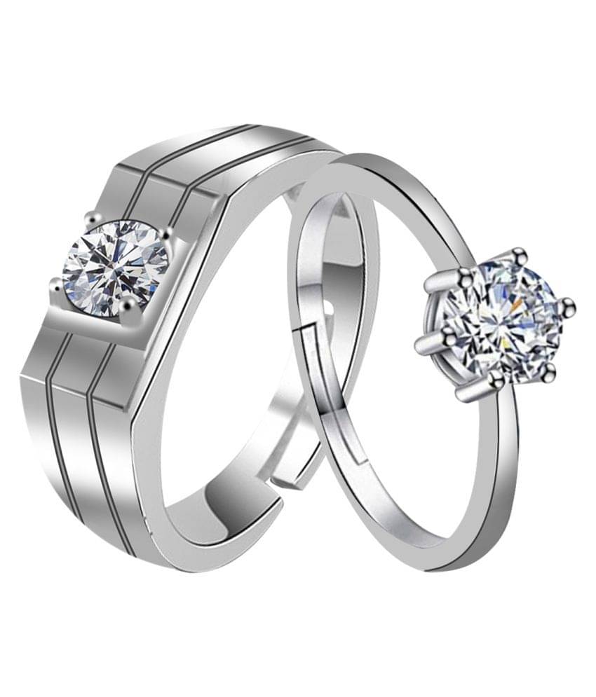 Paola Adjustable Couple Rings Set for lovers, Exclusive silver plated simple and gorgeous one diamond adjustable couple ring for men and women. Paola Adjustable Couple Rings Set for lovers, Exclusive silver plated simple and gorgeous one diamond adjustable couple ring for men and women.