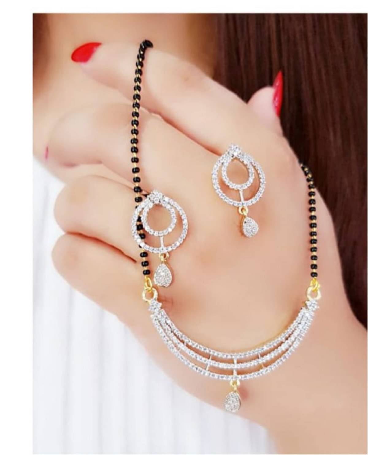 Navya Collections American Diamond Studded Mangalsutra Set Navya Collections American Diamond Studded Mangalsutra Set