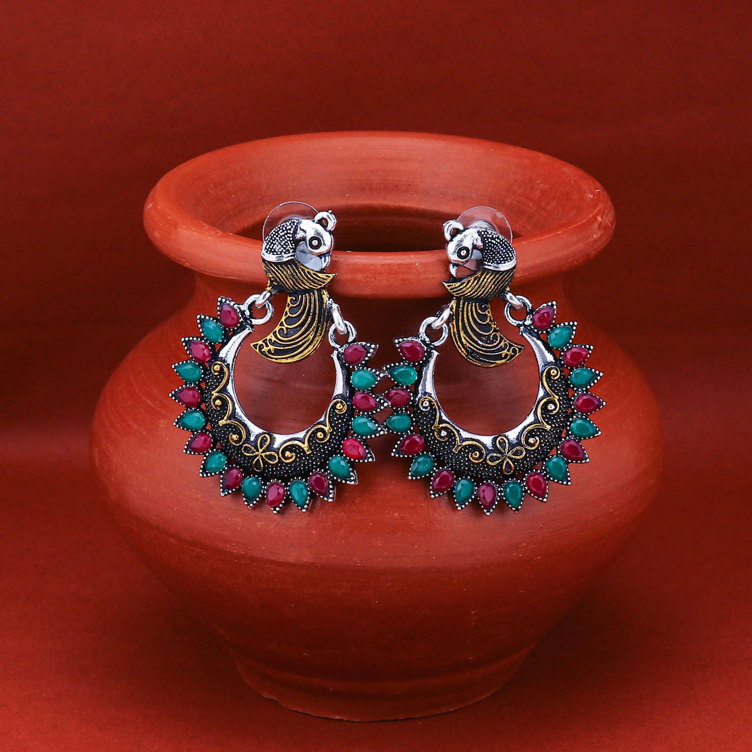     			Sukkhi Modish Oxidised Peacock Chandbali Earring for Women