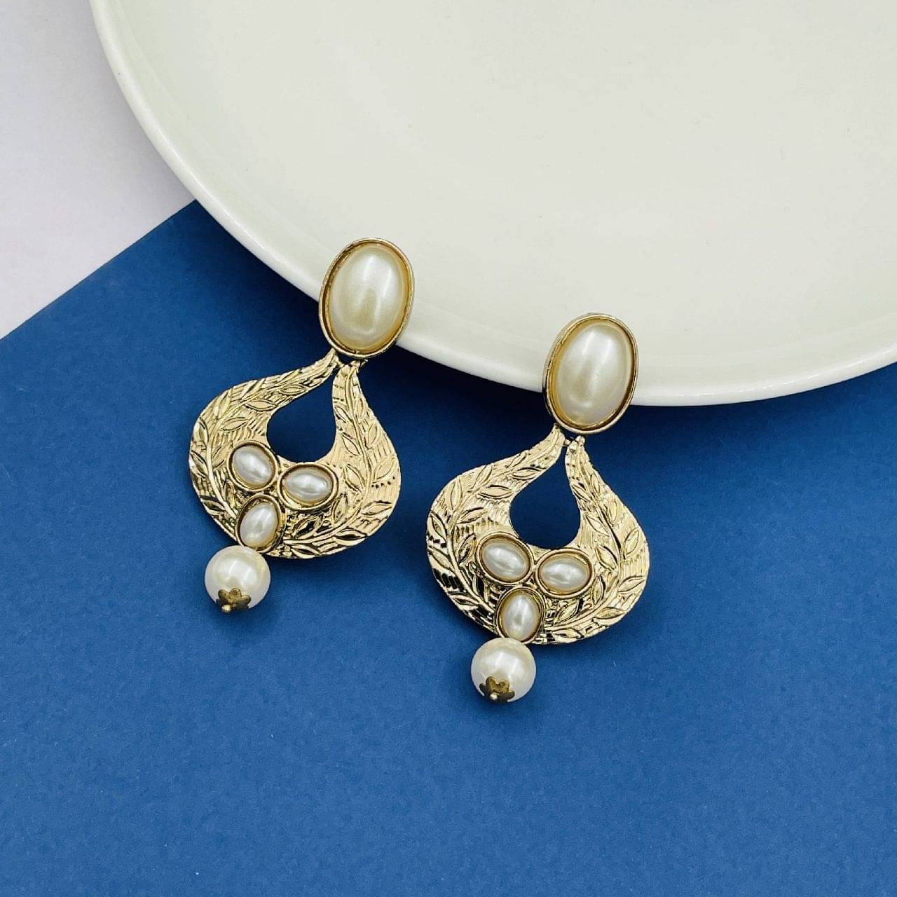     			The Jewelbox Golden Hanging Earrings
