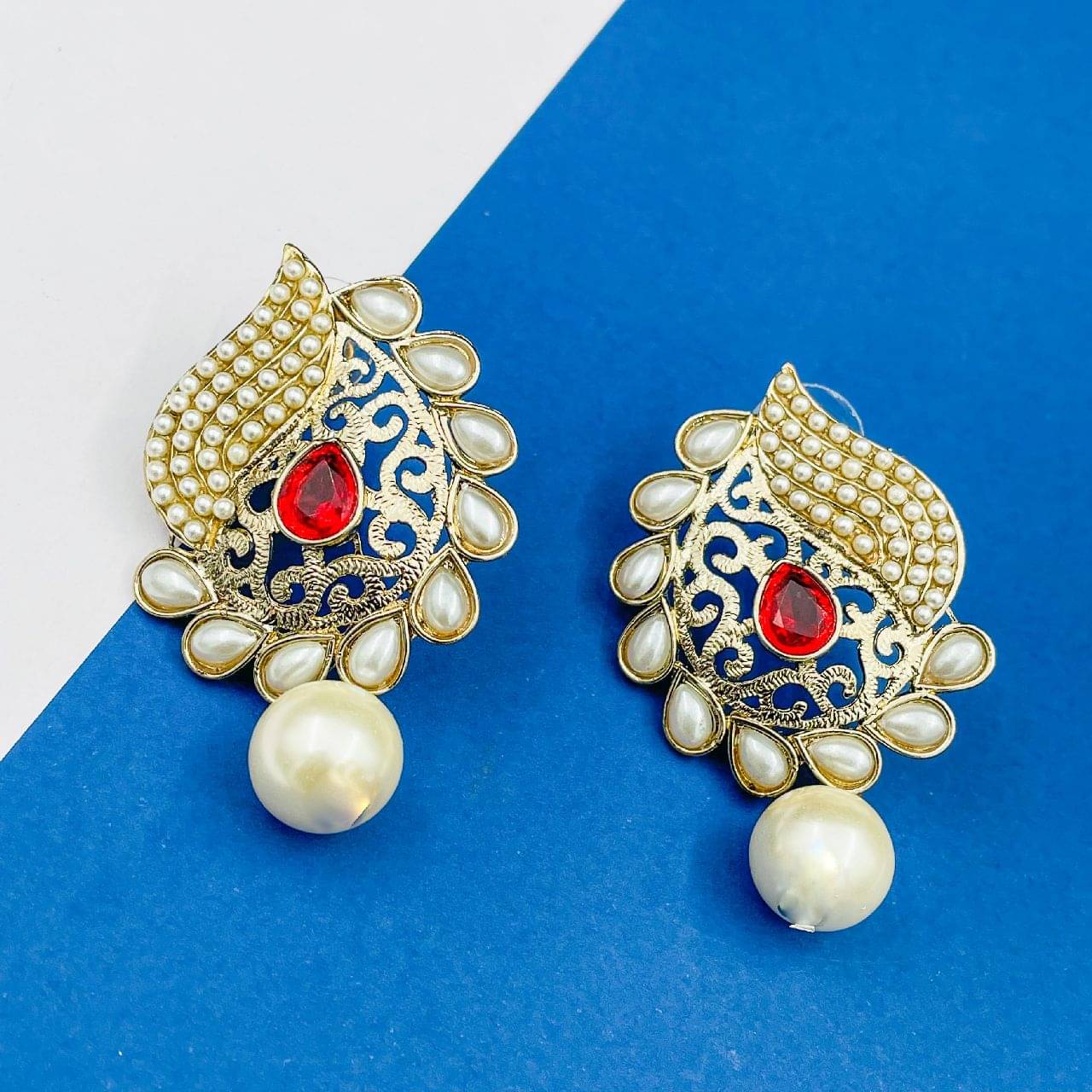     			The Jewelbox Red Copper Geometrics Stud Earrings