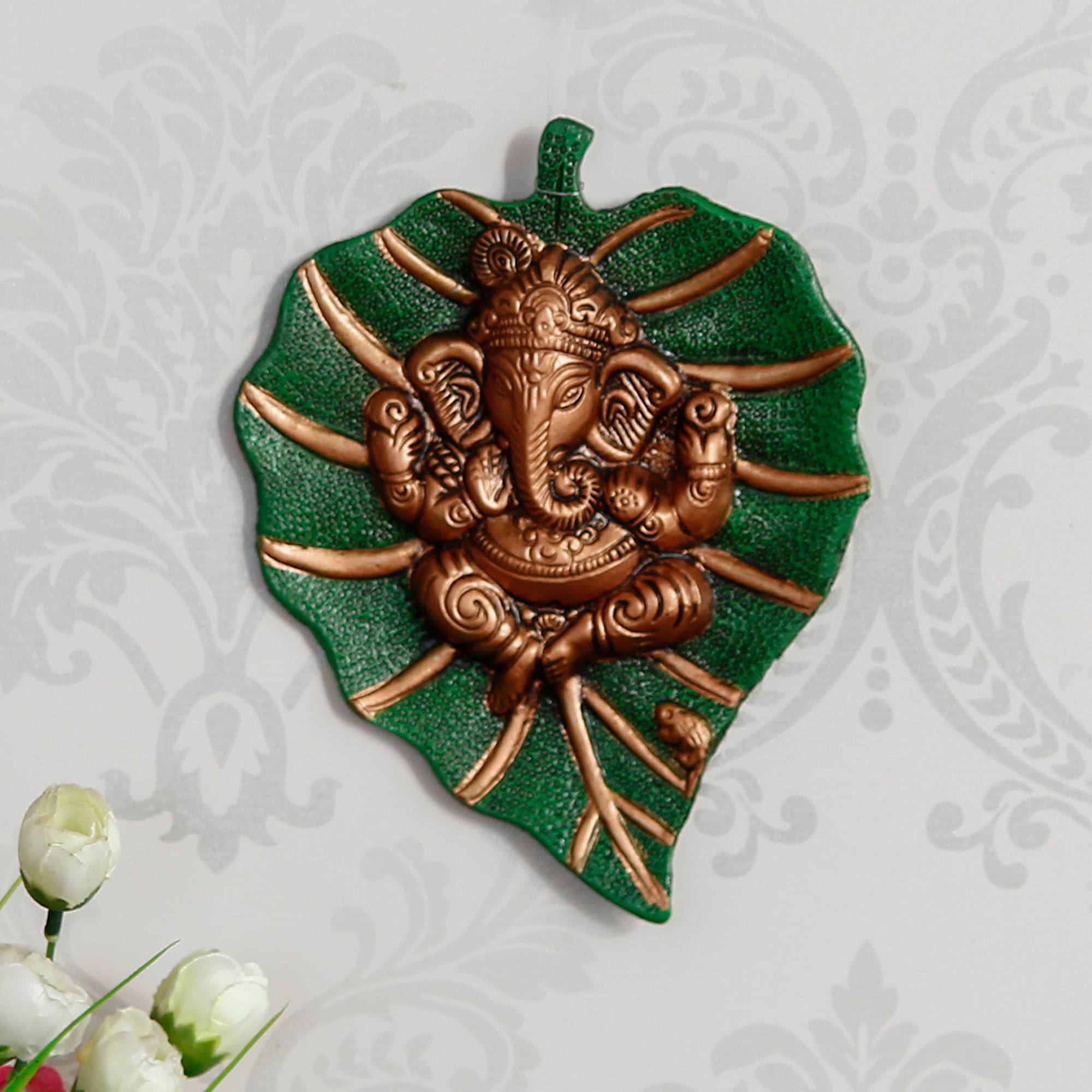 eCraftIndia Brown Lord Ganesha on Green Leaf Wall Hanging eCraftIndia Brown Lord Ganesha on Green Leaf Wall Hanging