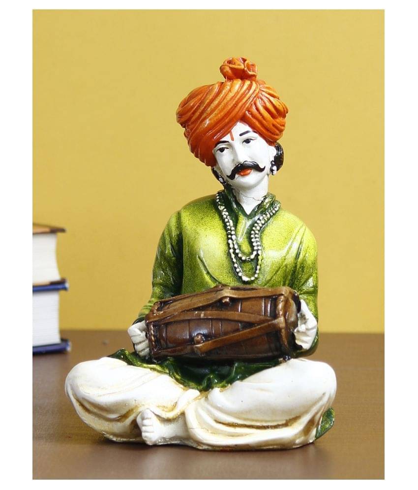 eCraftIndia Green & White Painted Men Musician Playing Dholak Handcrafted Showpiece eCraftIndia Green & White Painted Men Musician Playing Dholak Handcrafted Showpiece