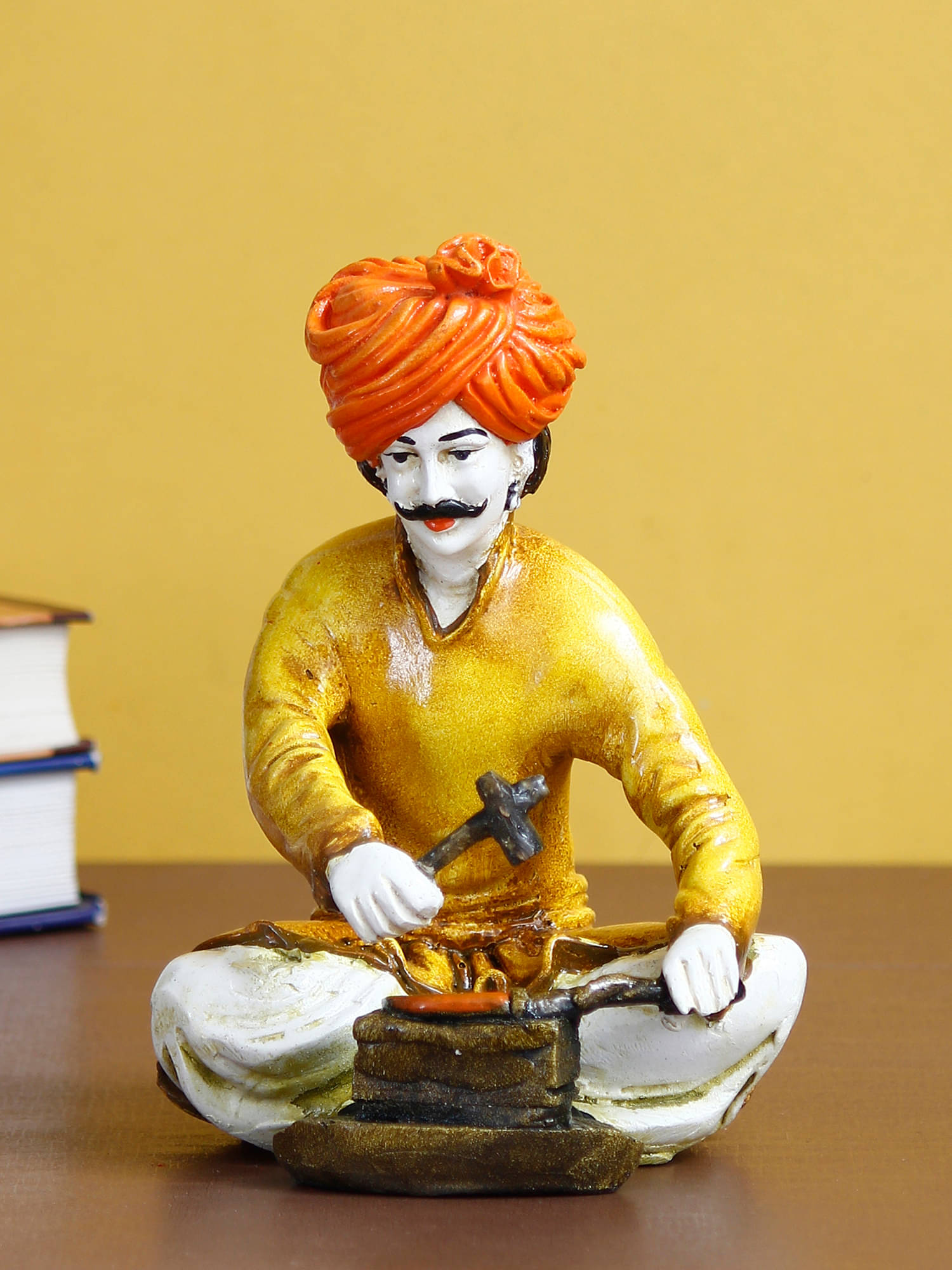 eCraftIndia Yellow & Orange Rajasthani Men Working With Hammer Handcrafted Decorative Polyresin Showpiece eCraftIndia Yellow & Orange Rajasthani Men Working With Hammer Handcrafted Decorative Polyresin Showpiece