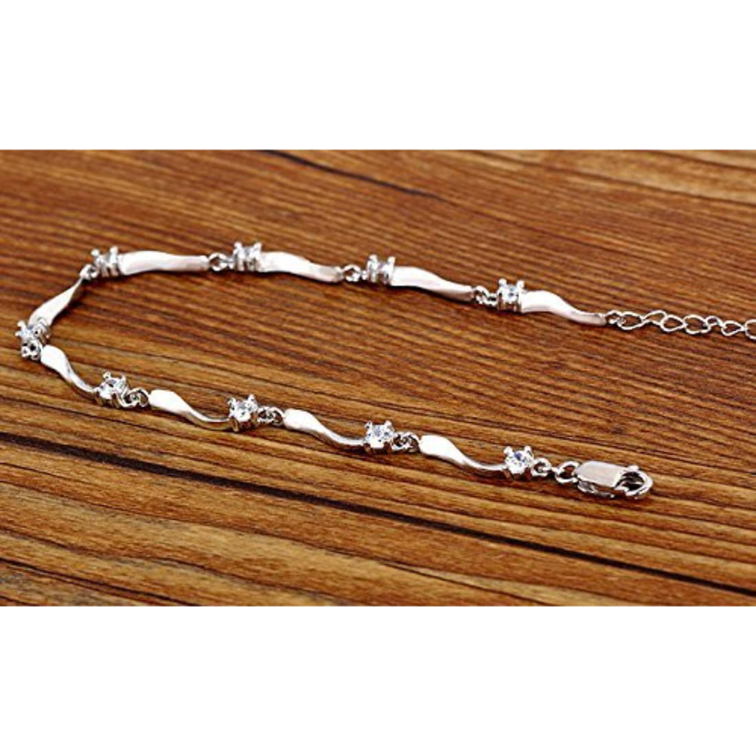 YouBella Stylish Latest Design Crystal Jewellery Silver Plated Charm Bracelet for Women (Silver) (YBBN_91646)     			YouBella Stylish Latest Design Crystal Jewellery Silver Plated Charm Bracelet for Women (Silver) (YBBN_91646)