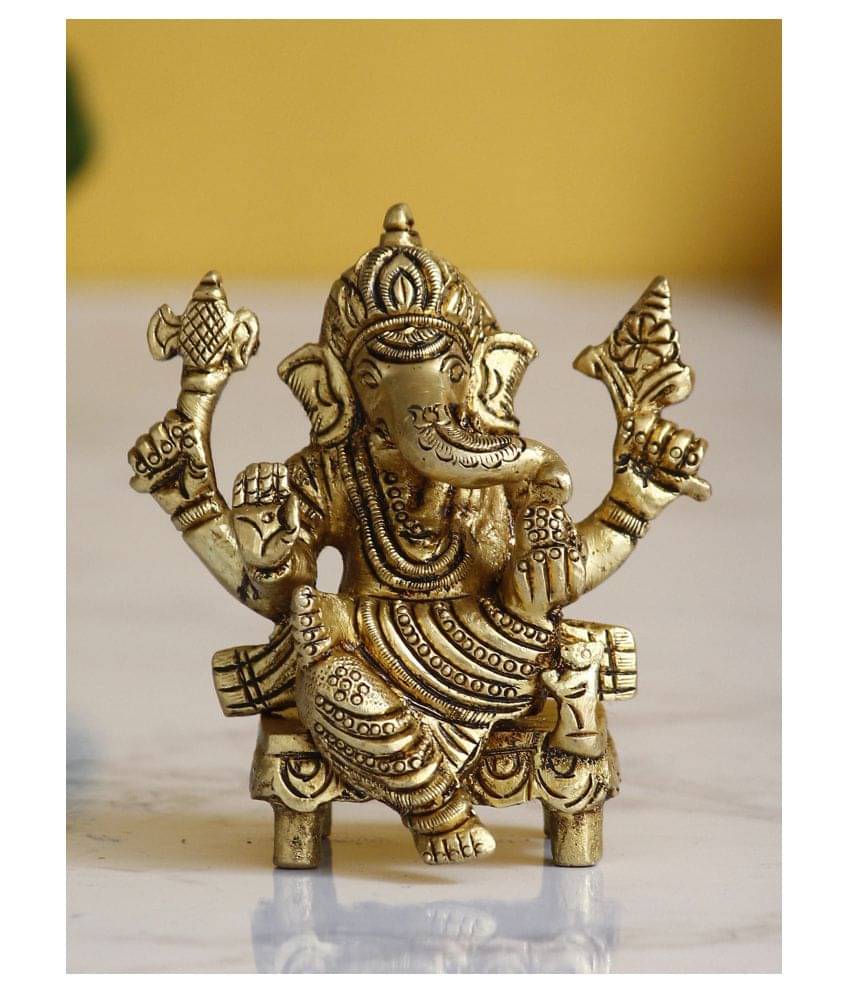 eCraftIndia Showpiece Brass Ganesha Idol 7 x 5 cms Pack of 1     			eCraftIndia Showpiece Brass Ganesha Idol 7 x 5 cms Pack of 1
