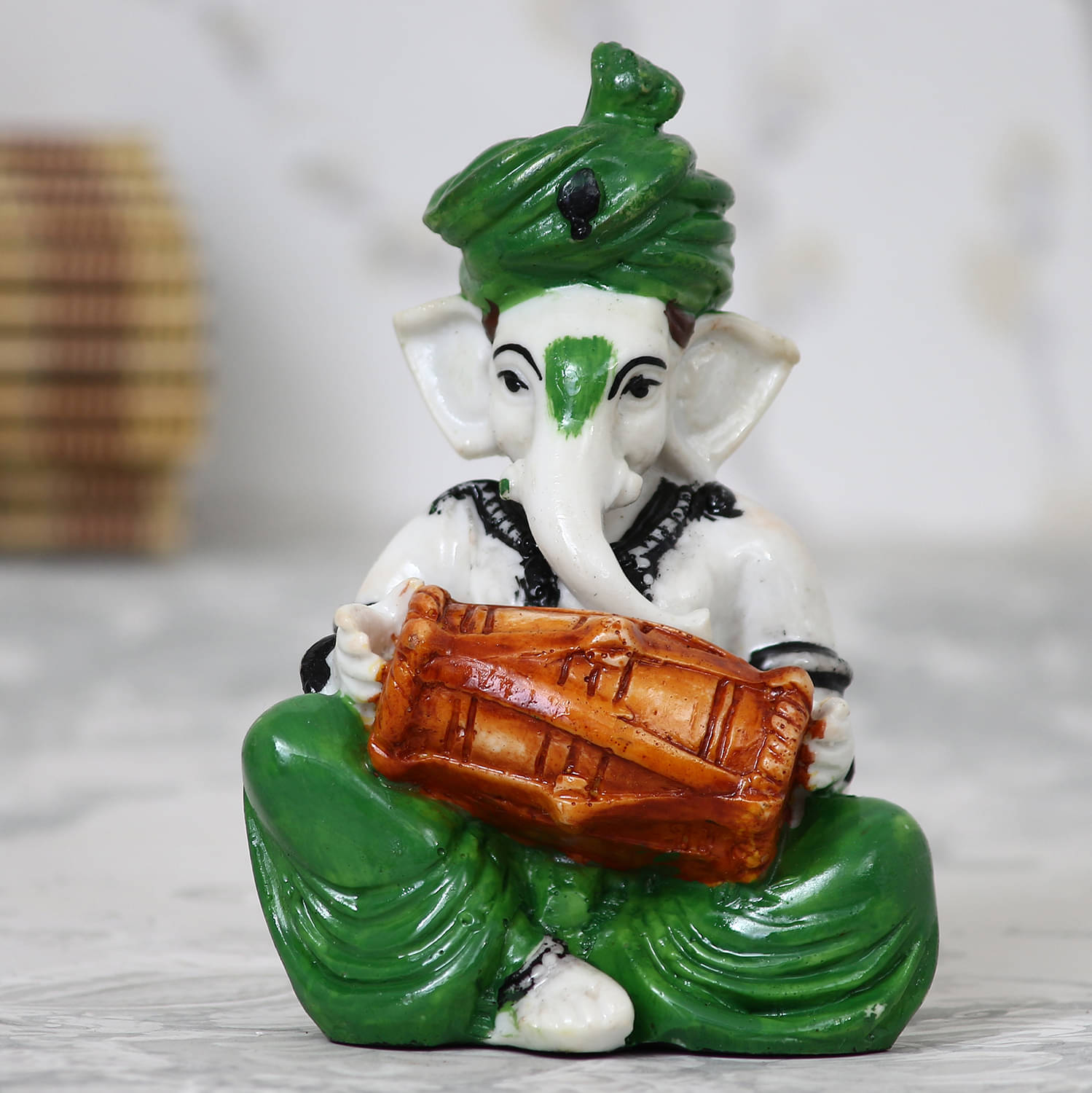 eCraftIndia Off-White & Green Handcrafted Lord Ganesha Playing Dholak Idol     			eCraftIndia Off-White & Green Handcrafted Lord Ganesha Playing Dholak Idol