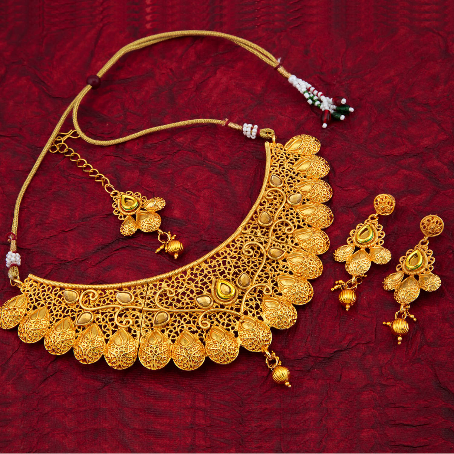     			Sukkhi Alloy Golden Traditional Necklaces Set Collar