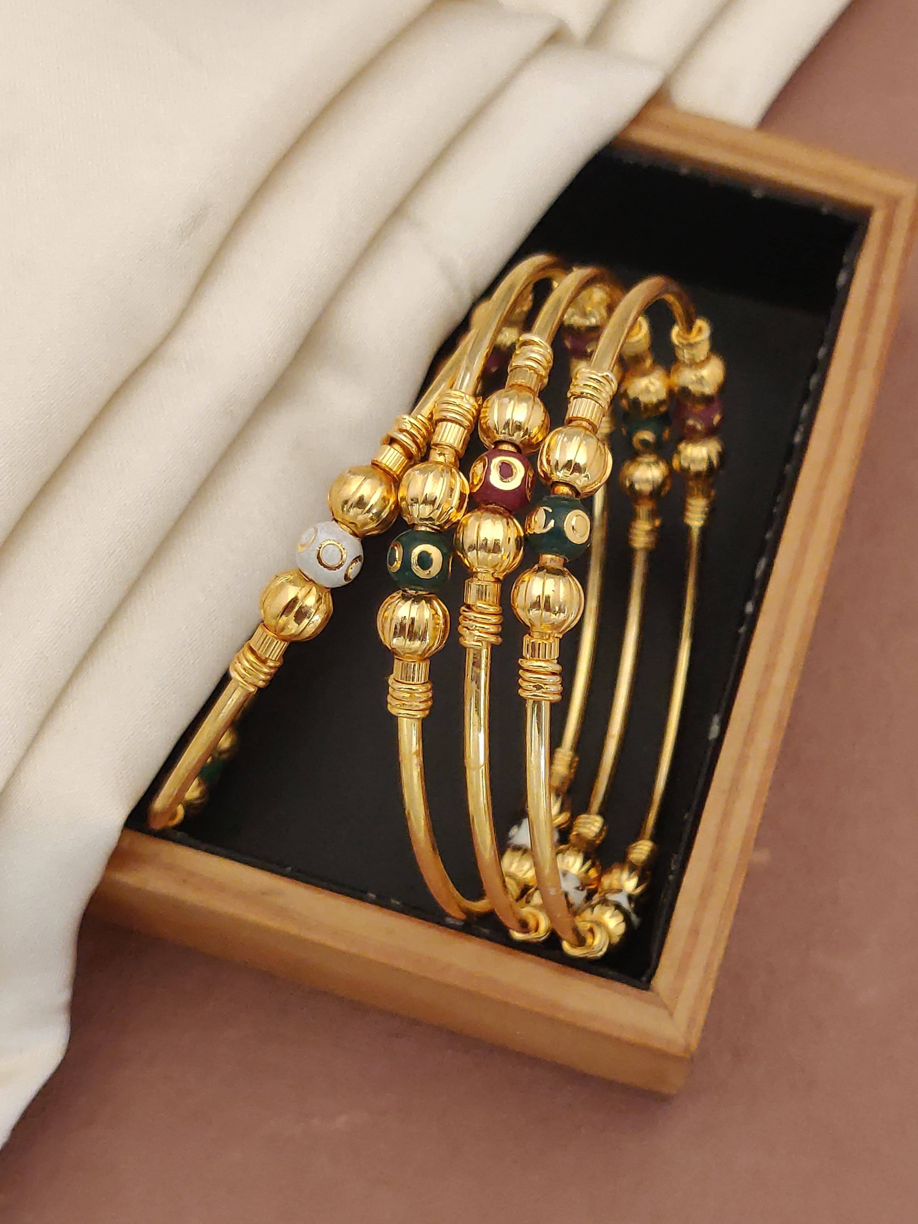 Shivay Fashion Gold Bangle Set ( Pack of 2 ) Shivay Fashion Gold Bangle Set ( Pack of 2 )
