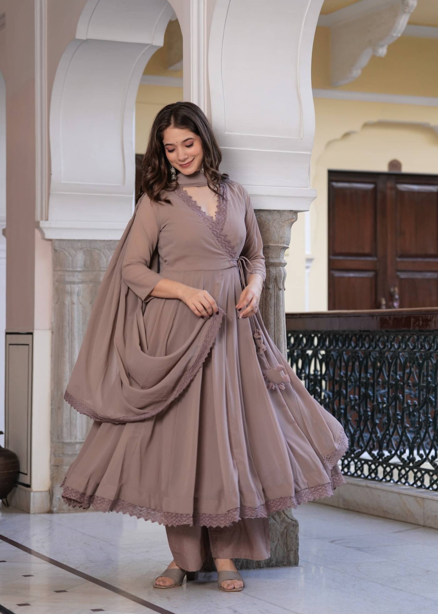 Sitaram Designer Georgette Solid Kurti With Pants Women's Stitched Salwar Suit - Beige ( Pack of 1 )     			Sitaram Designer Georgette Solid Kurti With Pants Women's Stitched Salwar Suit - Beige ( Pack of 1 )