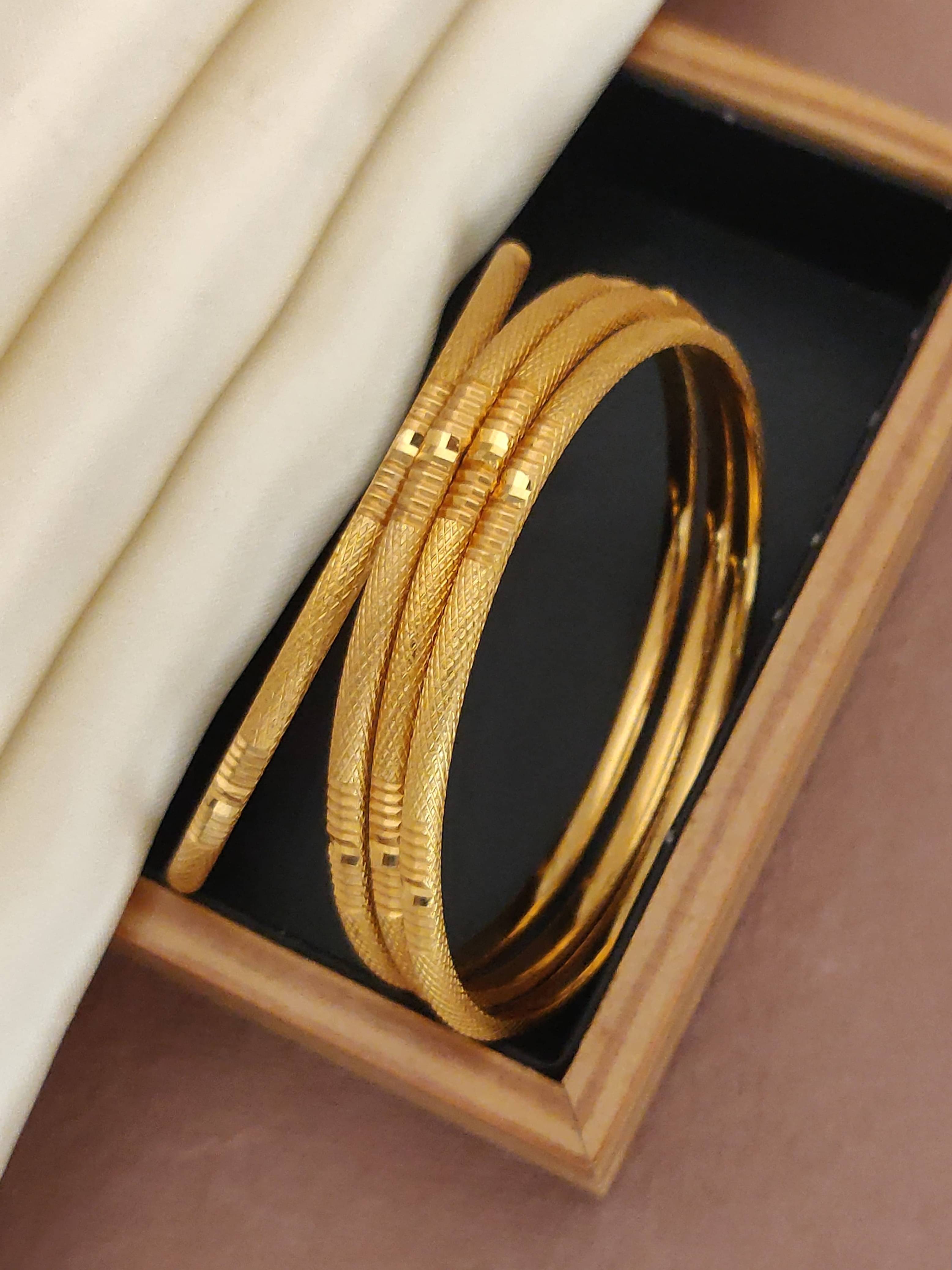     			Shivay Fashion Gold Bangle Set ( Pack of 2 )