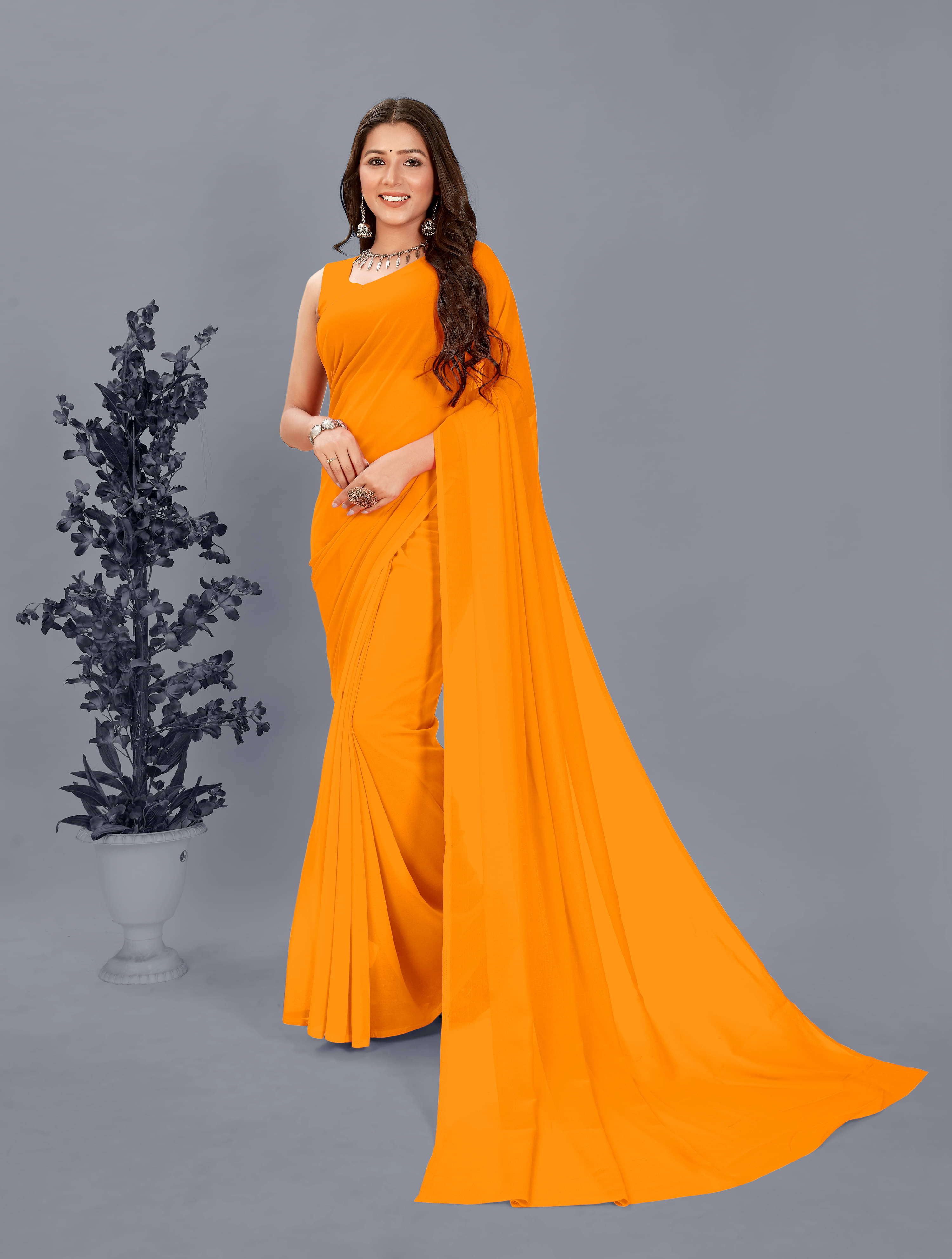 ANAND SAREES Georgette Solid Saree With Unstitched Blouse Piece ( Yellow ) ANAND SAREES Georgette Solid Saree With Unstitched Blouse Piece ( Yellow )