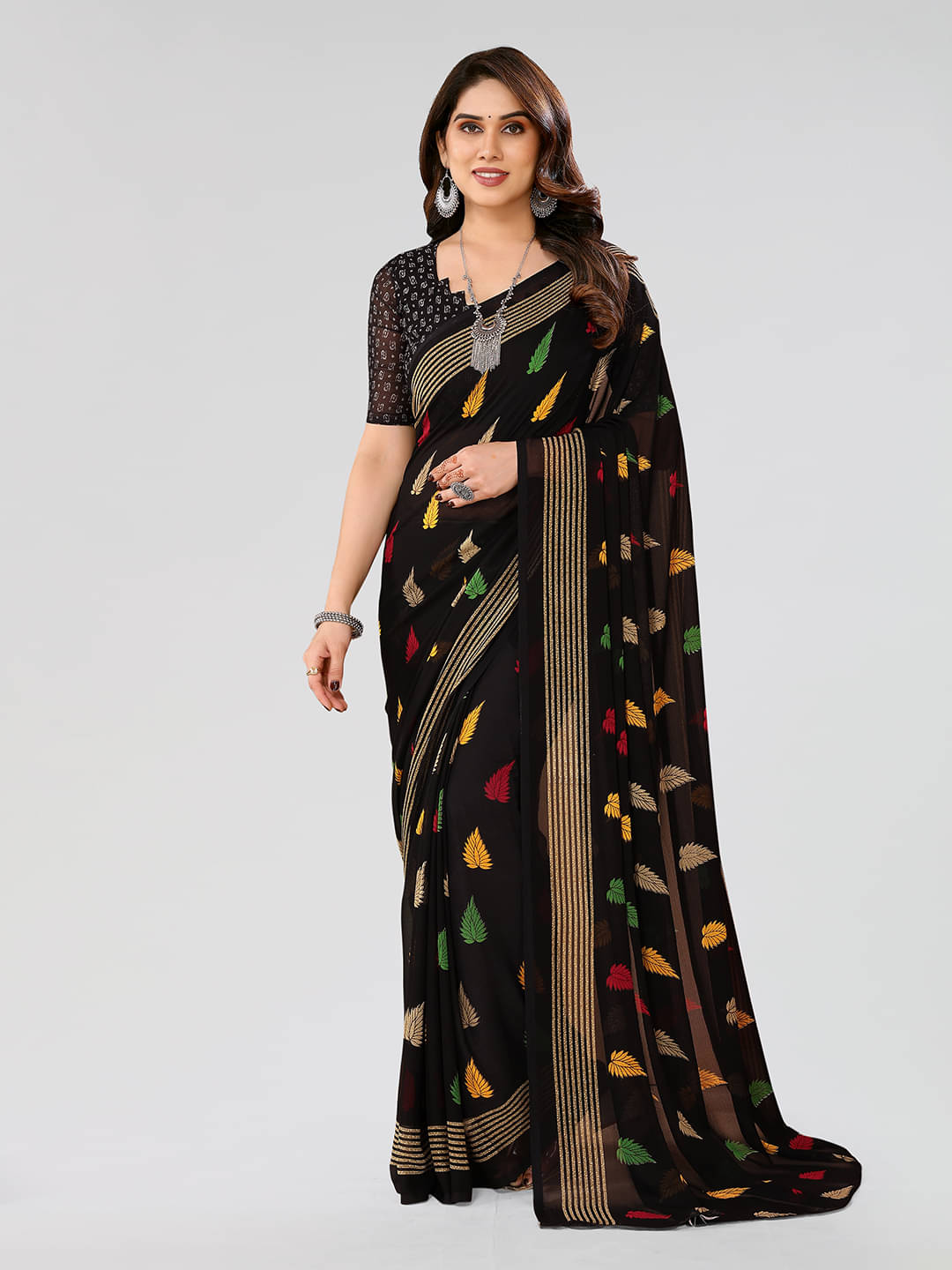 ANAND SAREES Georgette Printed Saree With Unstitched Blouse Piece ( Black ) ANAND SAREES Georgette Printed Saree With Unstitched Blouse Piece ( Black )