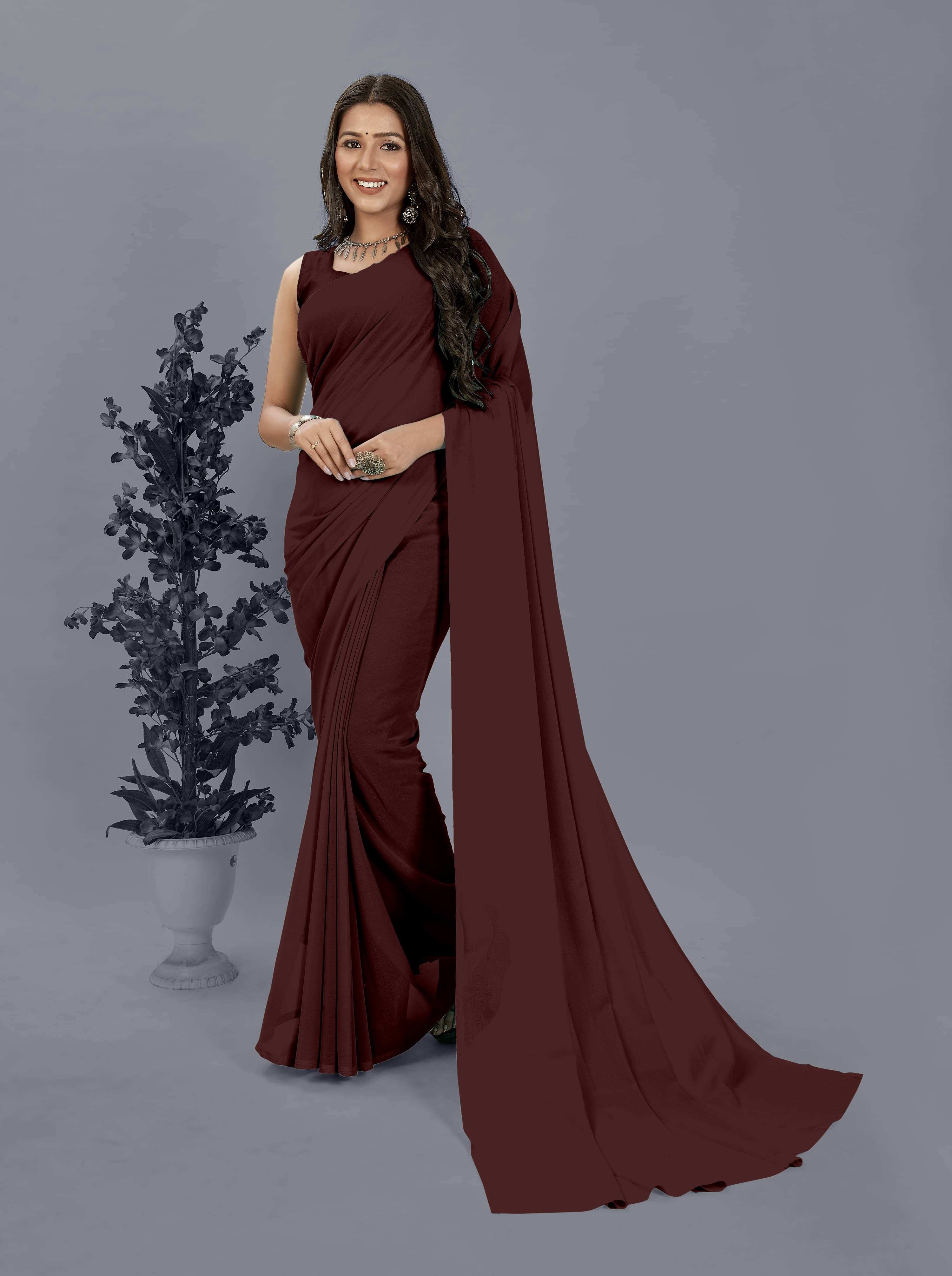 ANAND SAREES Georgette Solid Saree With Unstitched Blouse Piece ( Brown ) ANAND SAREES Georgette Solid Saree With Unstitched Blouse Piece ( Brown )