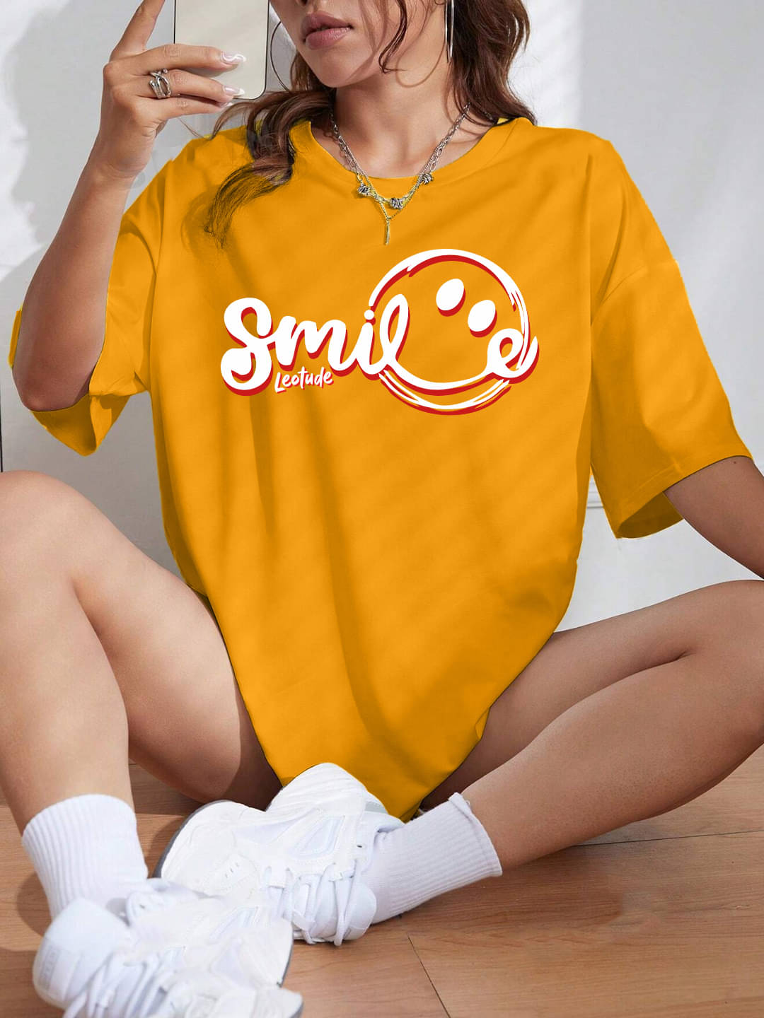 Leotude Women Cotton Blend Printed Oversized Fit Round Neck T-Shirt ( Yellow )     			Leotude Women Cotton Blend Printed Oversized Fit Round Neck T-Shirt ( Yellow )