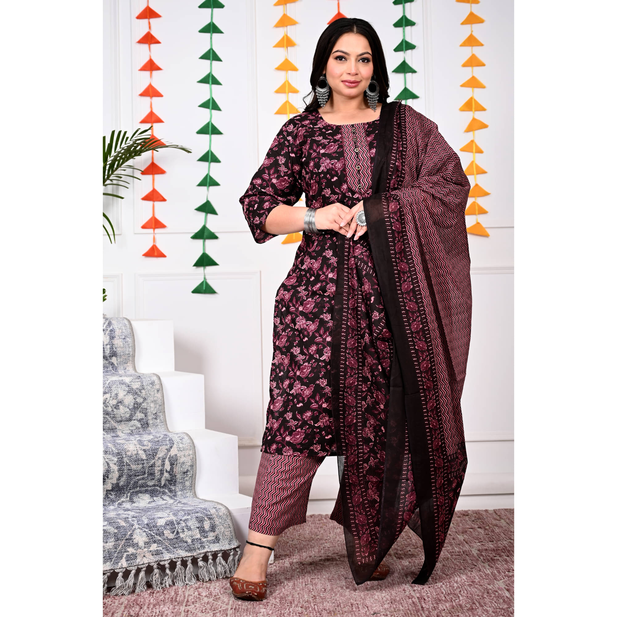 Swasti Cotton Printed Kurti With Palazzo Women's Stitched Salwar Suit - Purple ( Pack of 1 )     			Swasti Cotton Printed Kurti With Palazzo Women's Stitched Salwar Suit - Purple ( Pack of 1 )