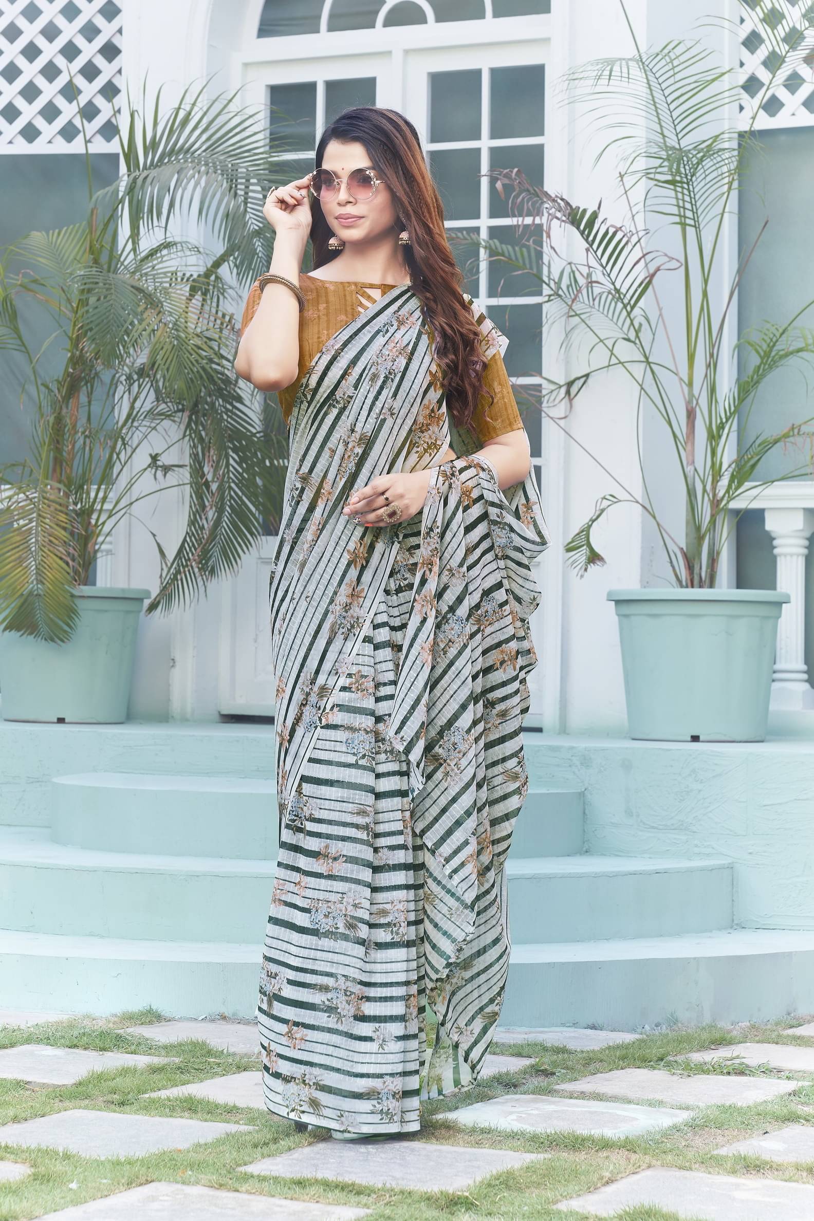     			Sariya Georgette Embroidered Saree With Unstitched Blouse Piece ( Black )