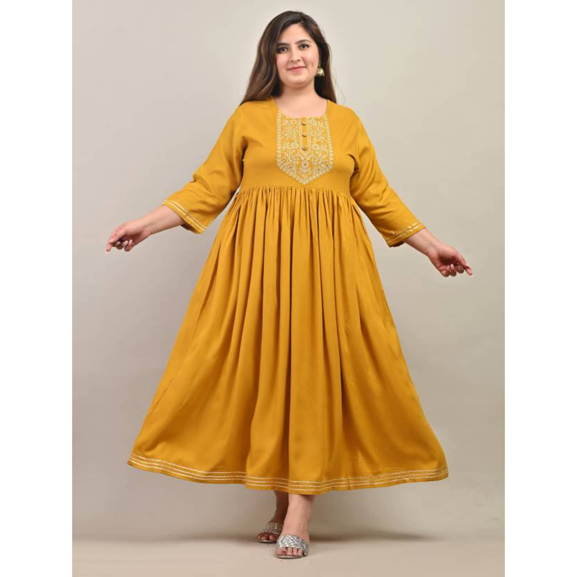     			Swasti Yellow Flared Cotton Blend Women's Stitched Ethnic Gown ( Pack of 1 )