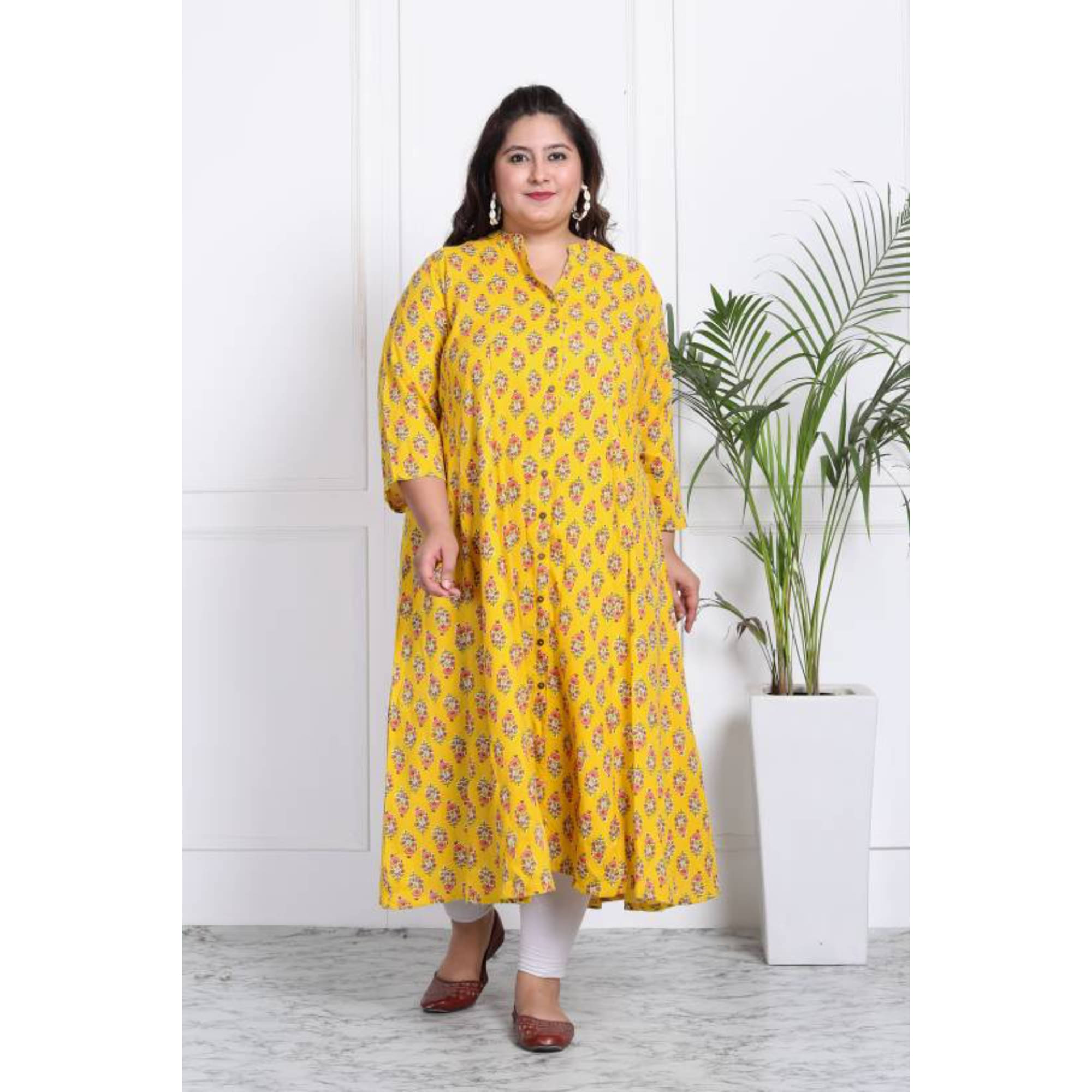     			Swasti Yellow Flared Cotton Blend Women's Stitched Ethnic Gown ( Pack of 1 )