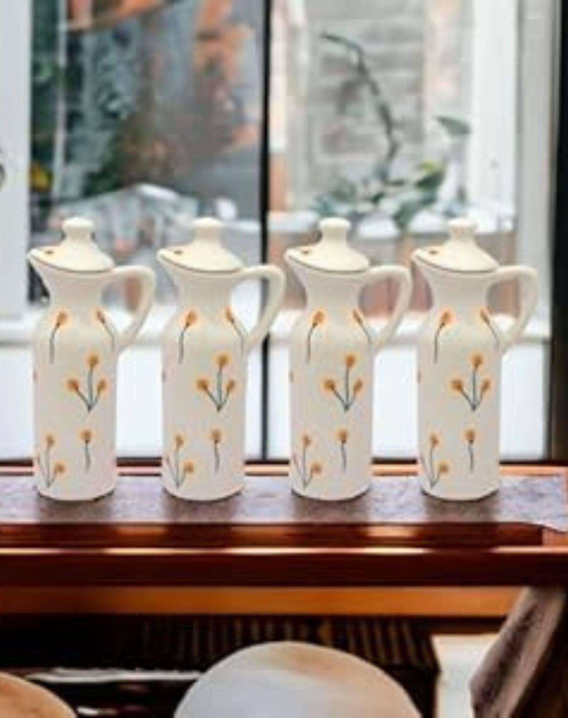 Malaikah Oil Dispenser Ceramic Off White Oil Container ( Set of 4 ) Malaikah Oil Dispenser Ceramic Off White Oil Container ( Set of 4 )