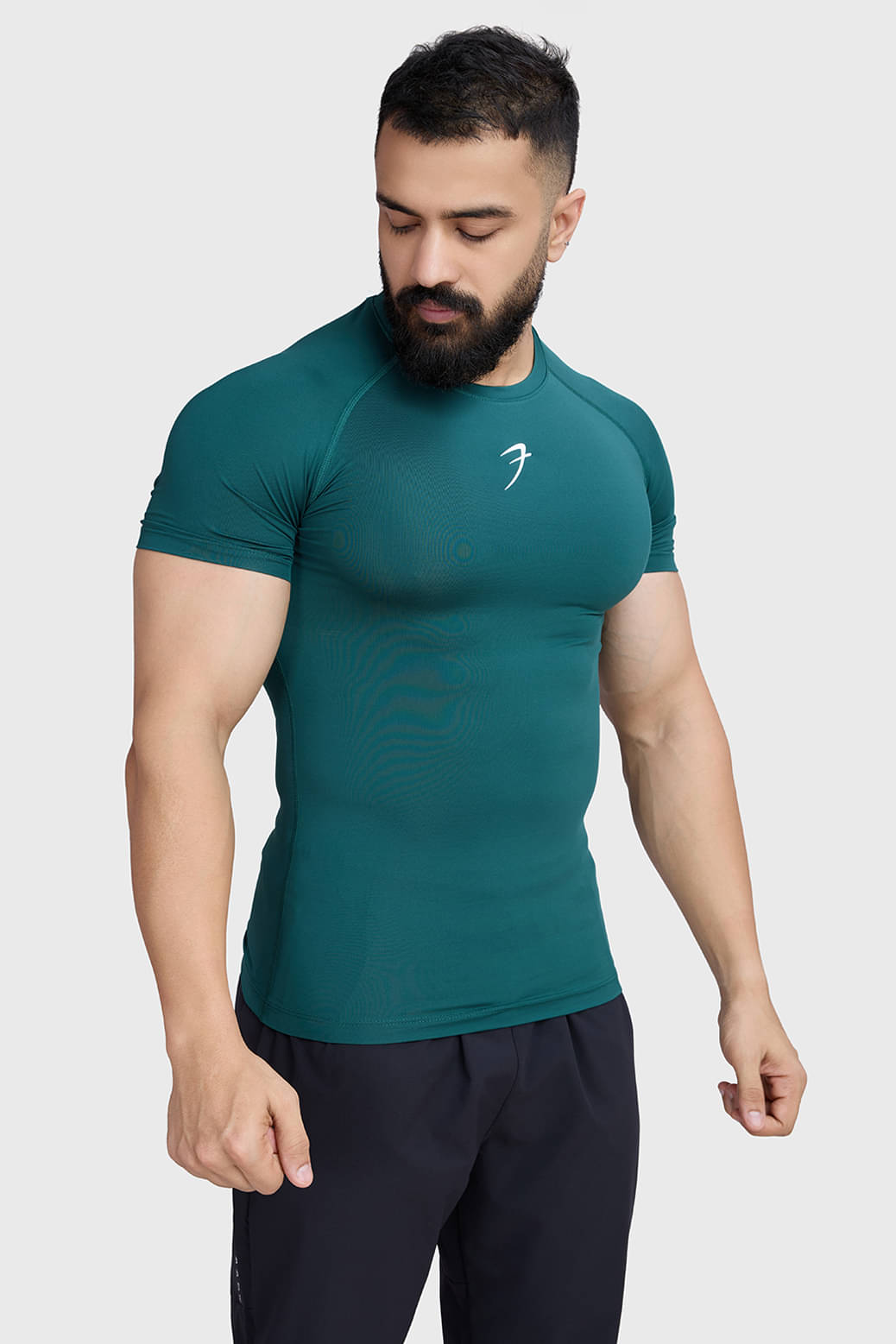     			Fuaark Green Polyester Slim Fit Men's Compression T-Shirt ( Pack of 1 )