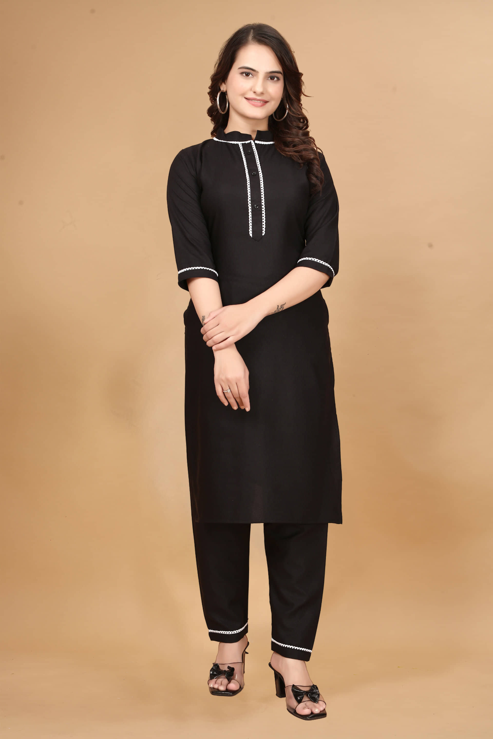 Nirja Fab Rayon Solid Kurti With Pants Women's Stitched Salwar Suit - Black ( Pack of 1 )
