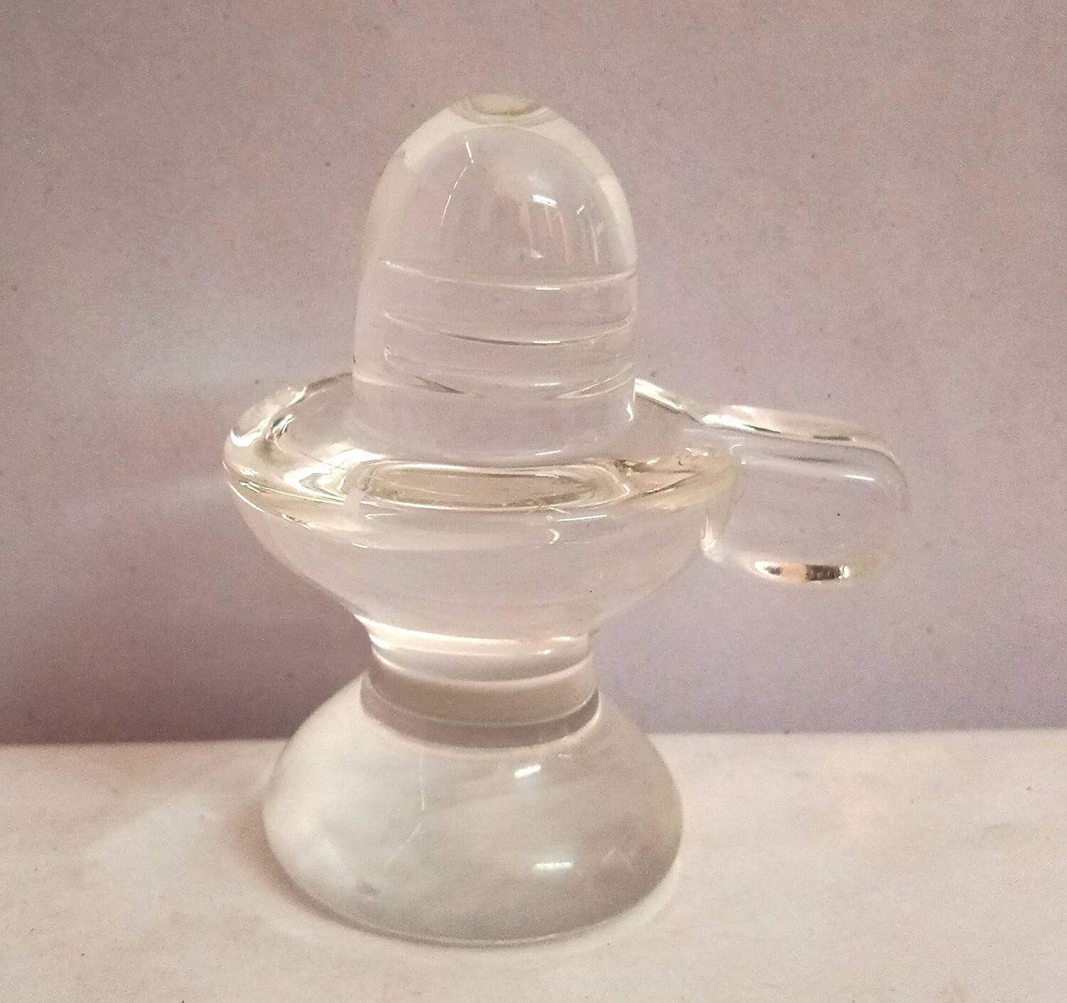     			Shri Astha Vinayak Glass Shivling Idol ( 2 cm )