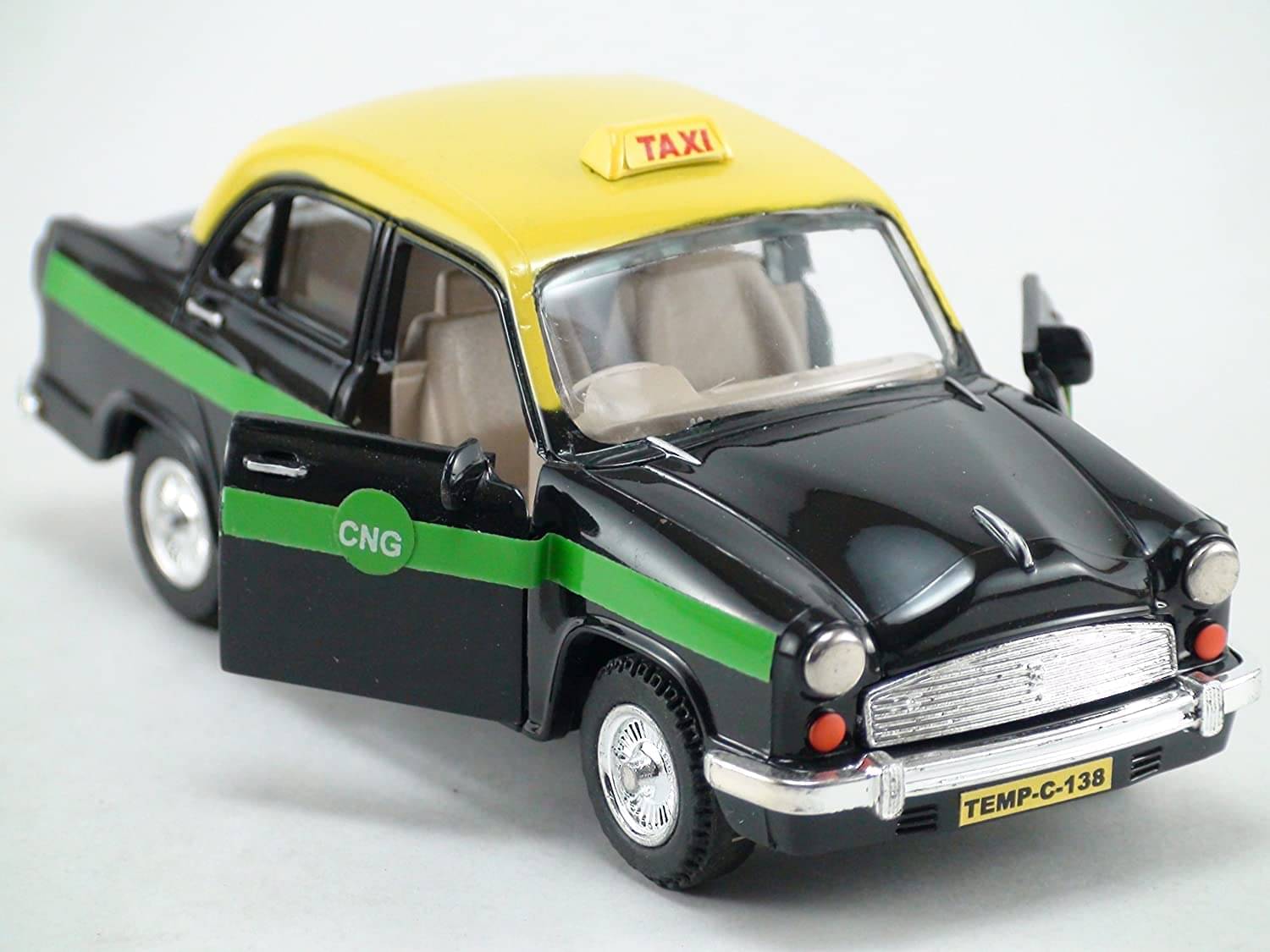     			Ambassador Taxi car Toy, Pull Back Action, Excellent Body Graphics, Door openable Pack of 1