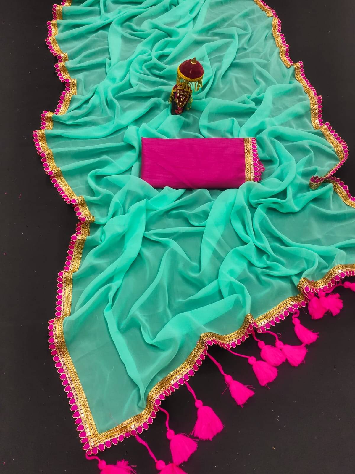 Kalpana Creation Georgette Solid Saree With Unstitched Blouse Piece ( SkyBlue ) Kalpana Creation Georgette Solid Saree With Unstitched Blouse Piece ( SkyBlue )