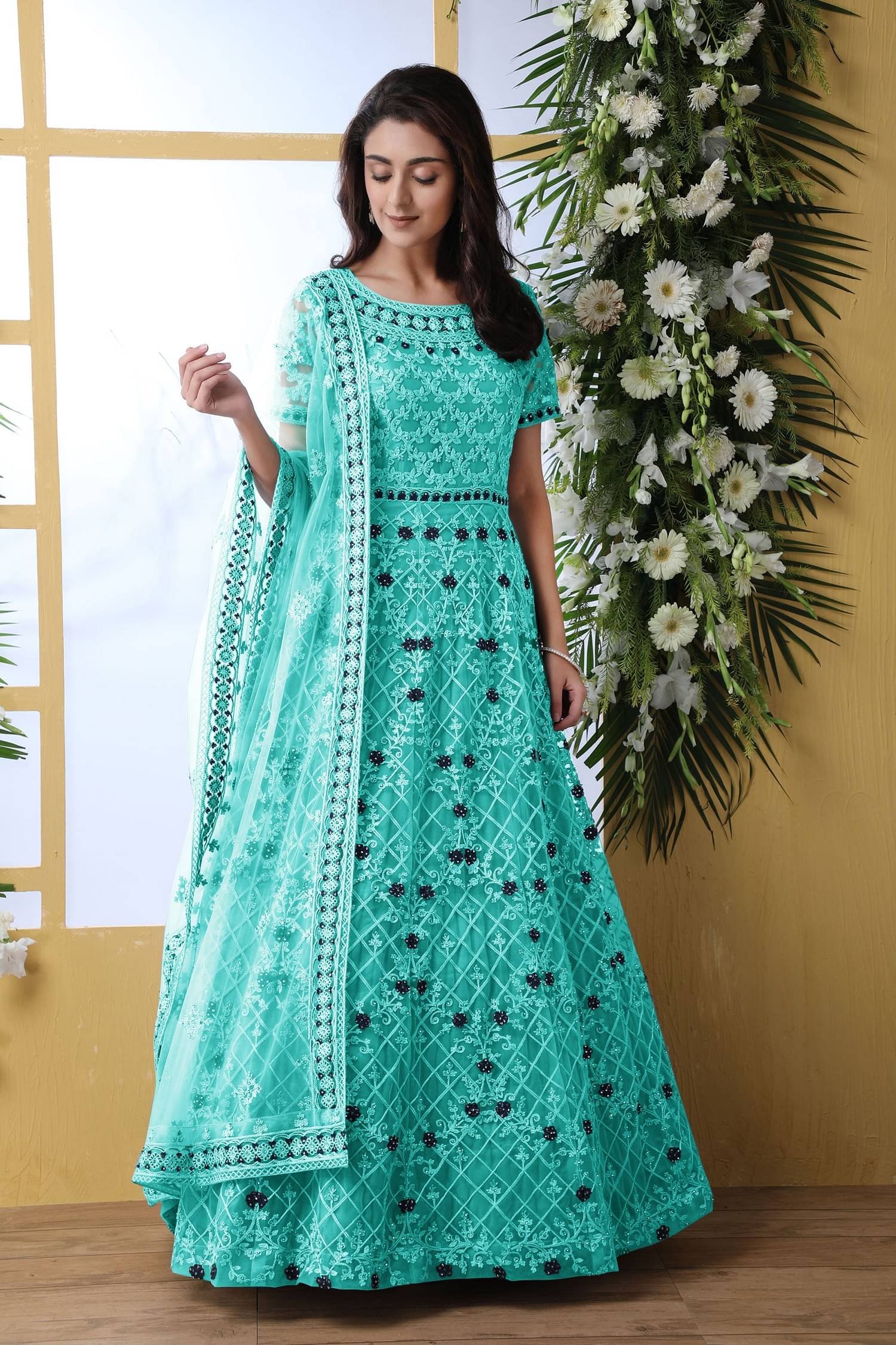     			Lady Shopi Turquoise Flared Net Women's Semi Stitched Ethnic Gown ( Pack of 1 )