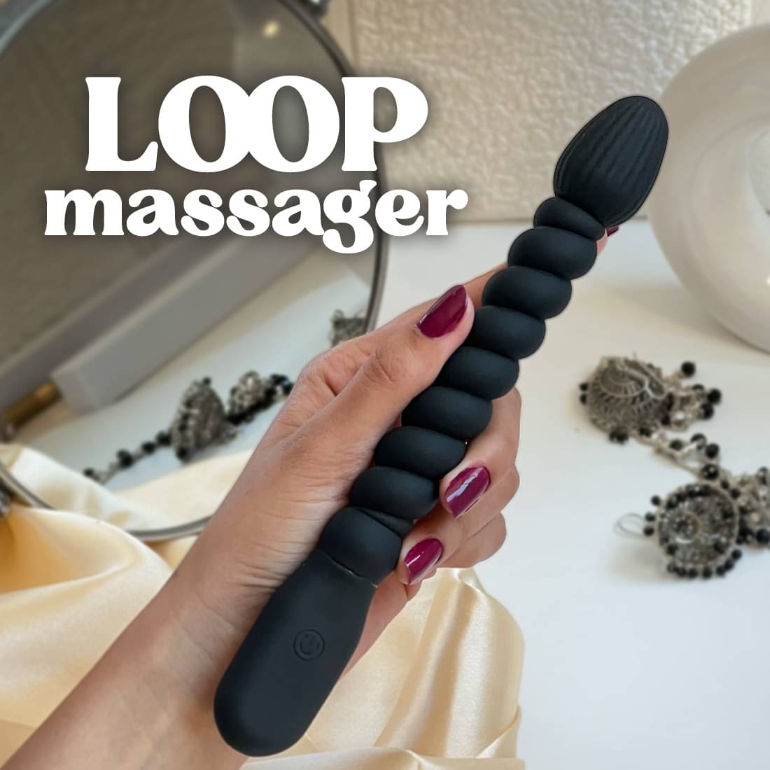     			Calmras Loop Portable Manual Massager