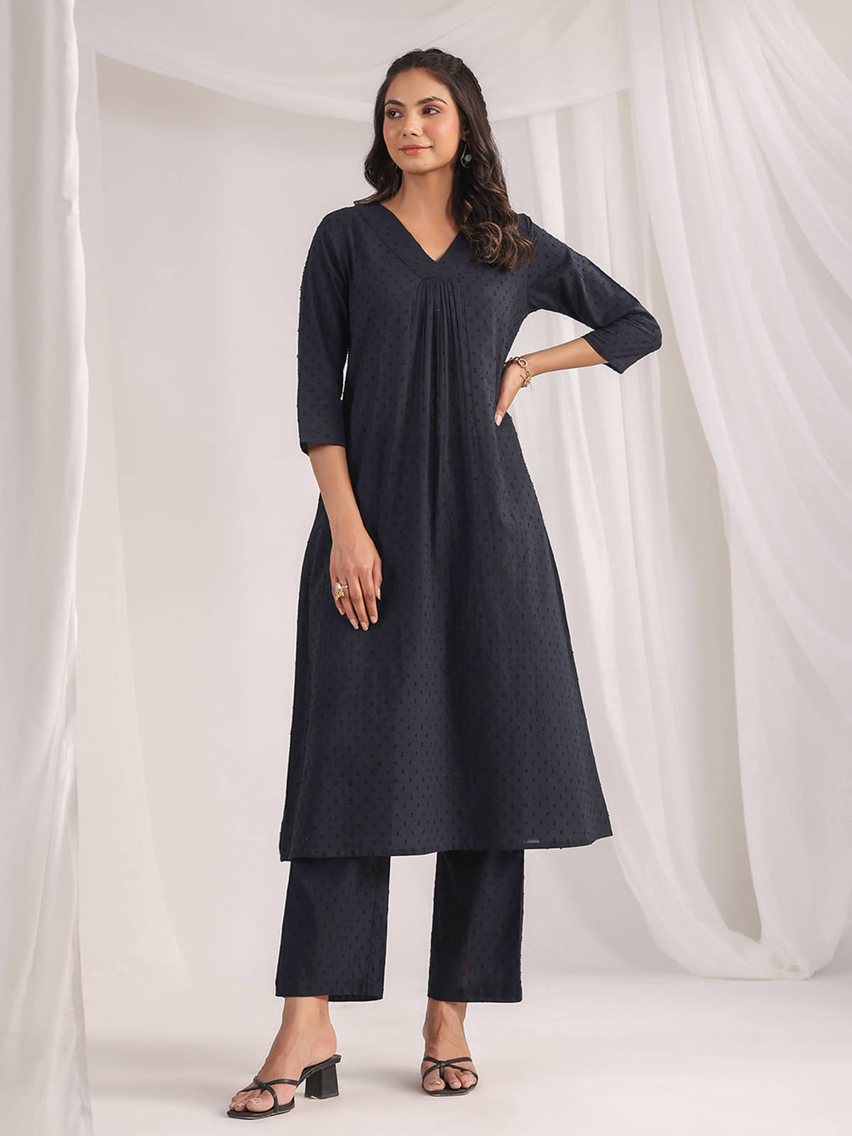     			Janasya Cotton Self Design Kurti With Pants Women's Stitched Salwar Suit - Black ( Pack of 1 )