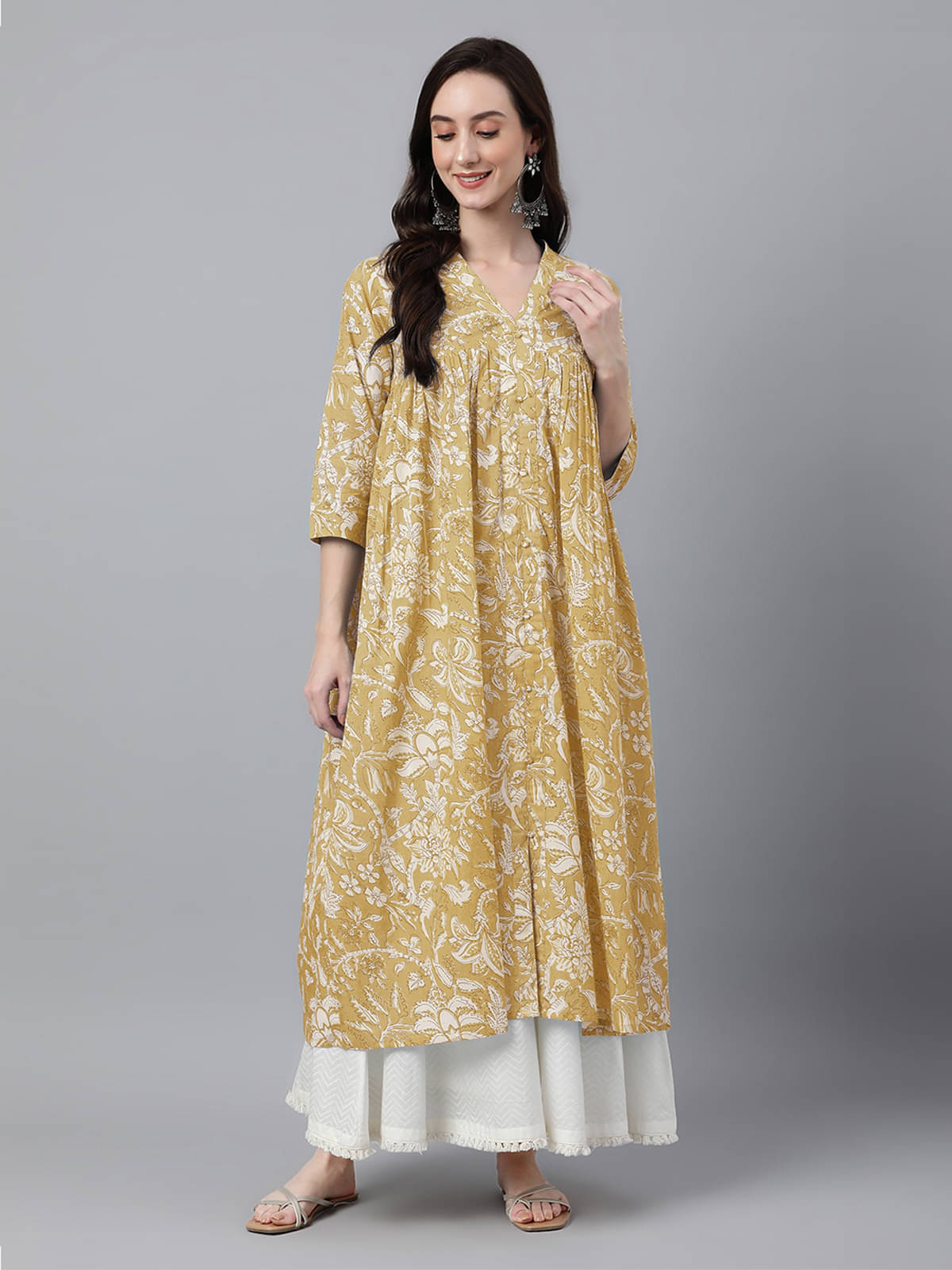     			Janasya Pack of 1 Cotton Printed Flared Women's Kurti - ( Mustard )