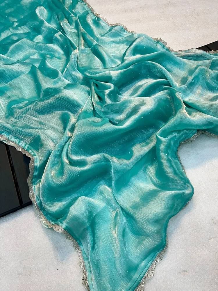 JULEE Net Embellished Saree With Unstitched Blouse Piece ( SkyBlue ) JULEE Net Embellished Saree With Unstitched Blouse Piece ( SkyBlue )