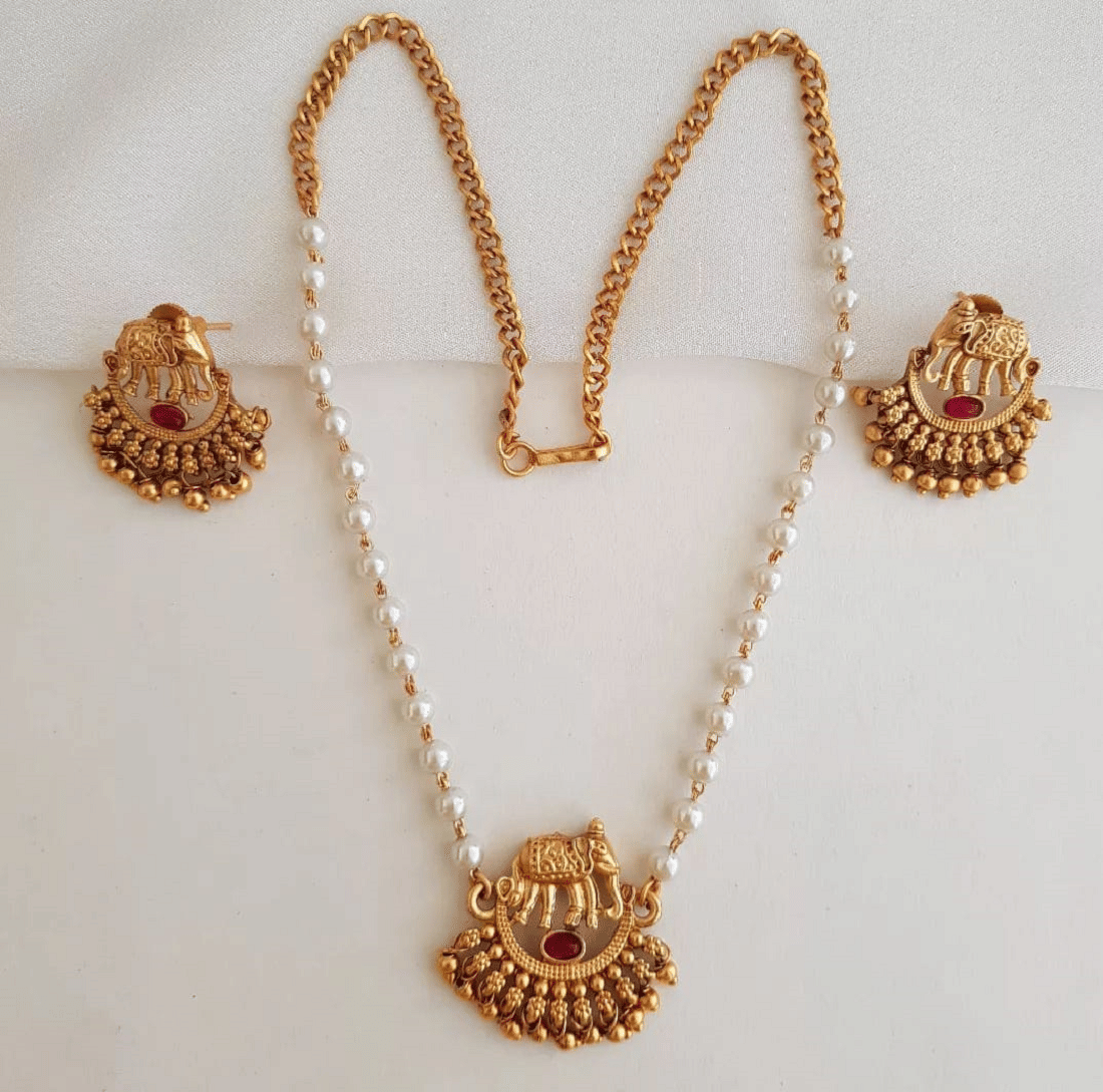RIENTA JWL Golden Alloy Necklace Set ( Pack of 1 )