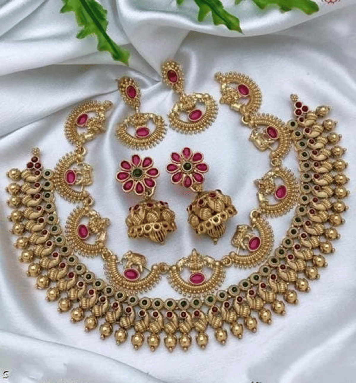     			RIENTA JWL Golden Alloy Necklace Set ( Pack of 2 )