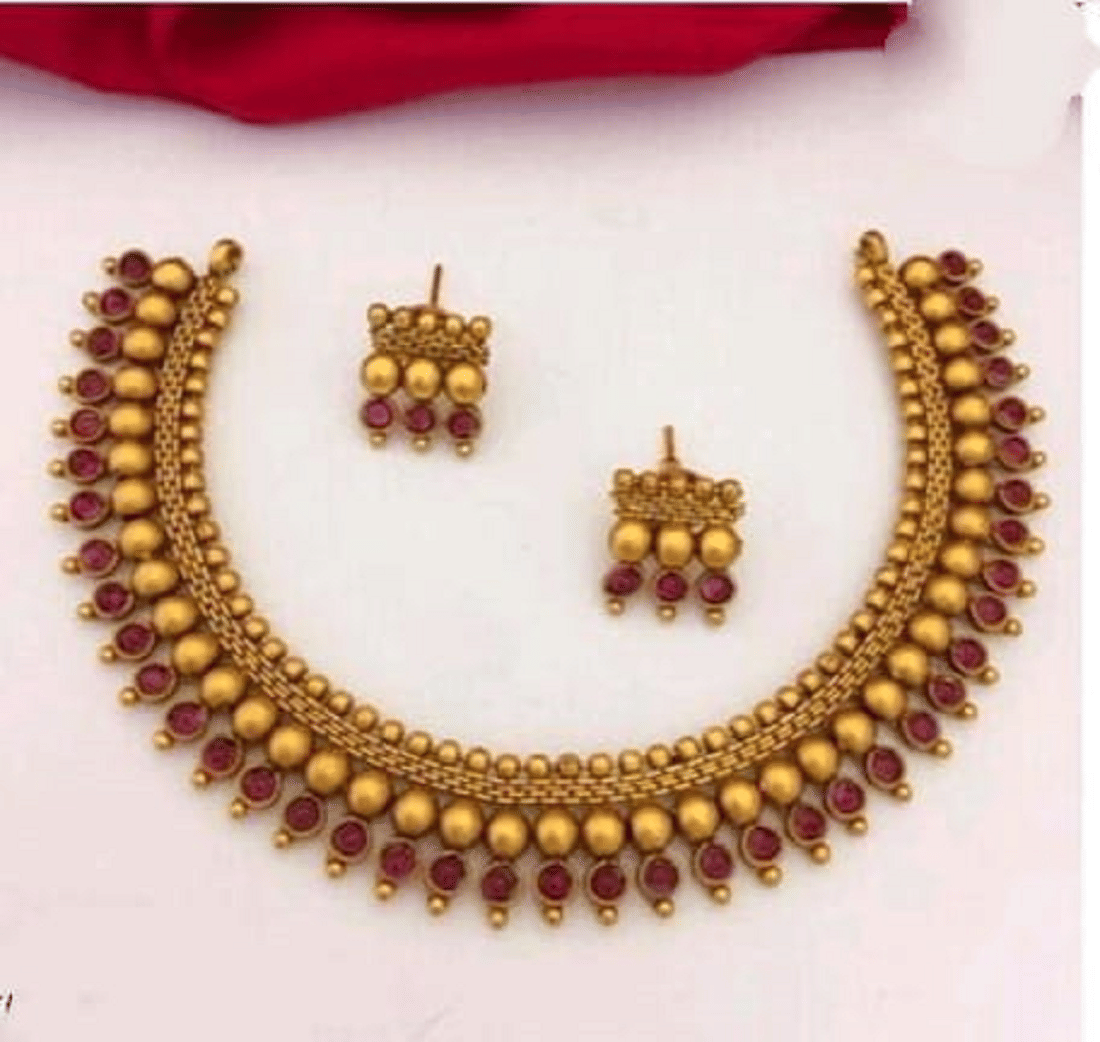     			RIENTA JWL Golden Alloy Necklace Set ( Pack of 1 )