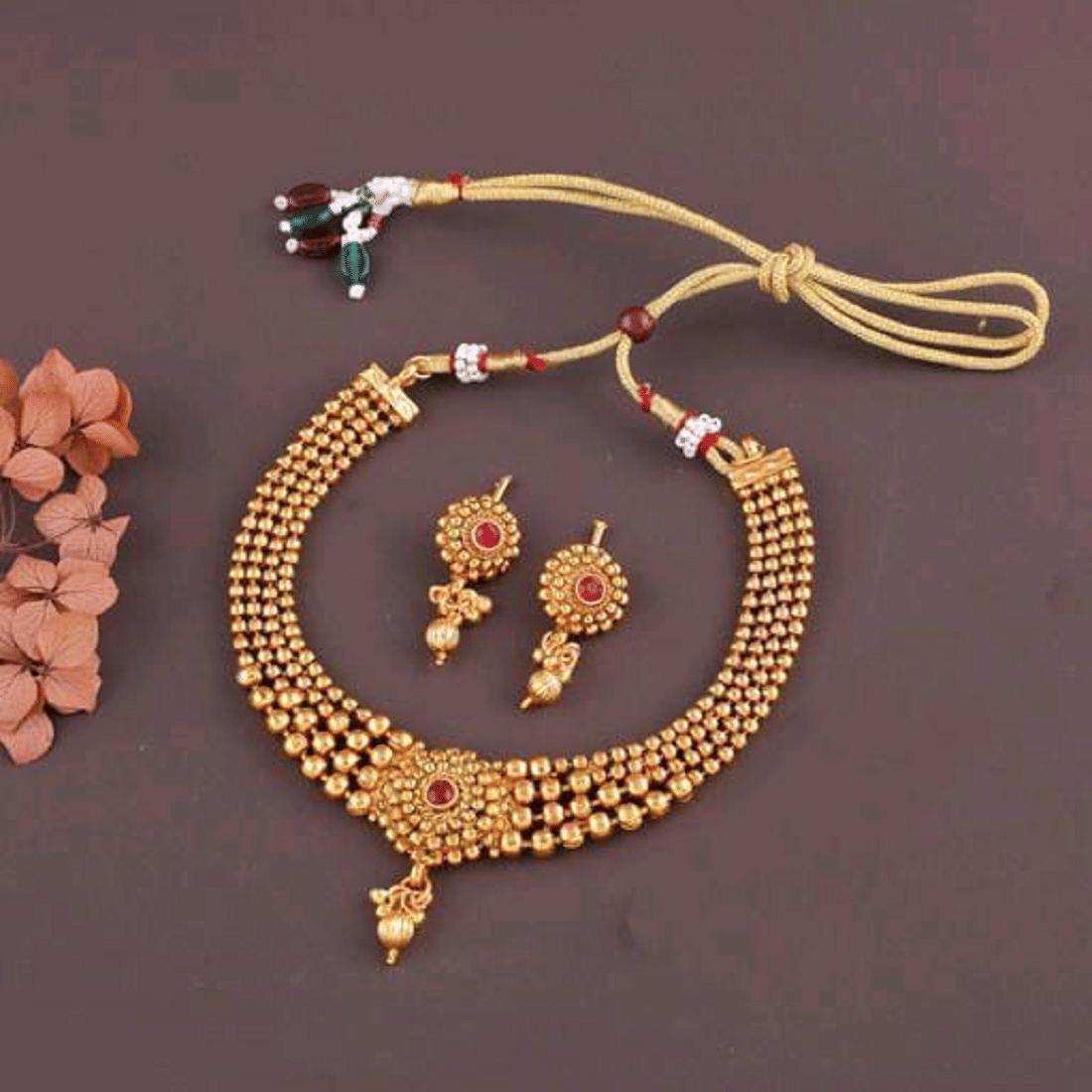 RIENTA JWL Golden Alloy Necklace Set ( Pack of 1 )