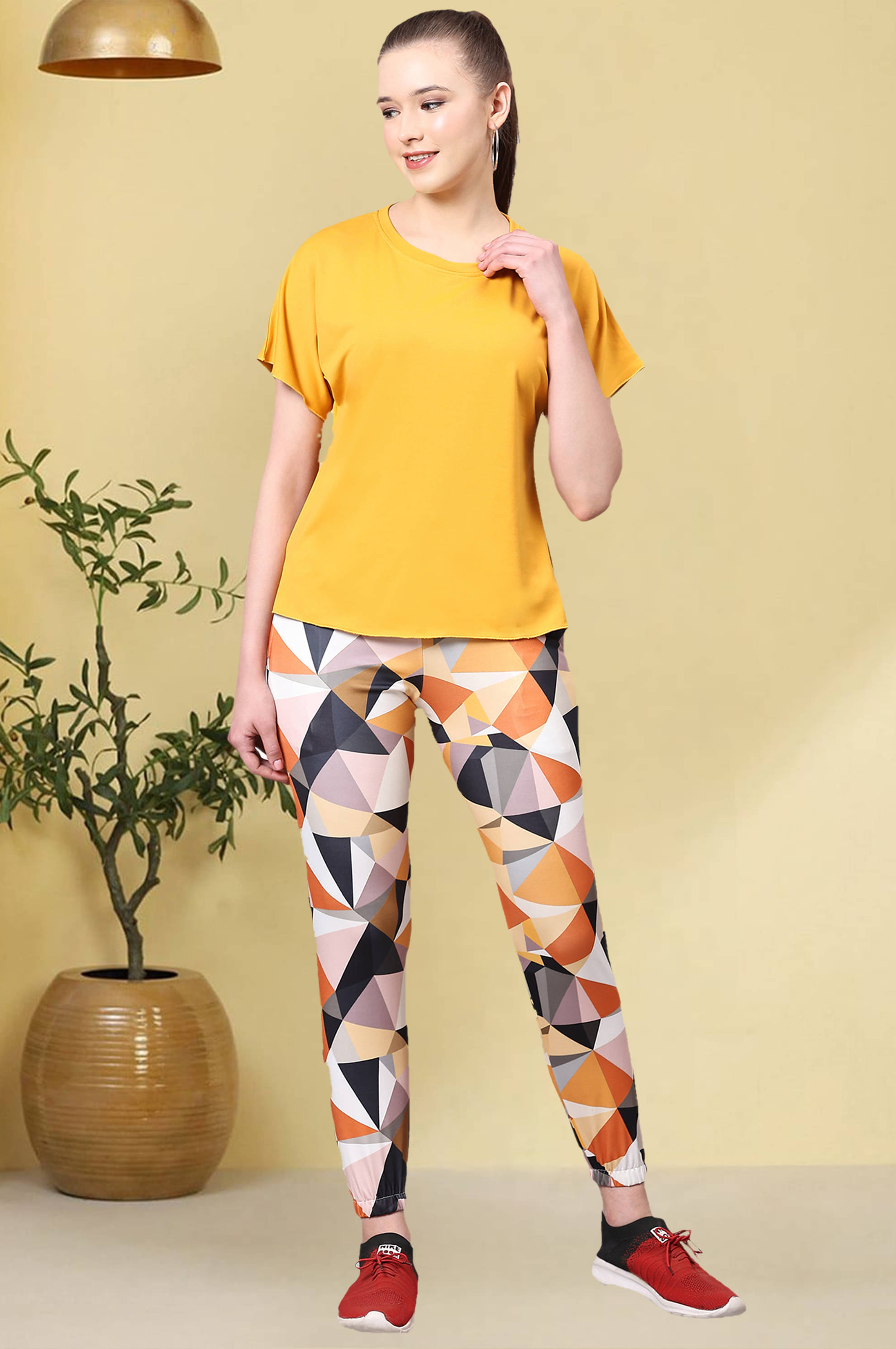    			CUBIQ Yellow Cotton Blend Solid Tracksuit - Pack of 1