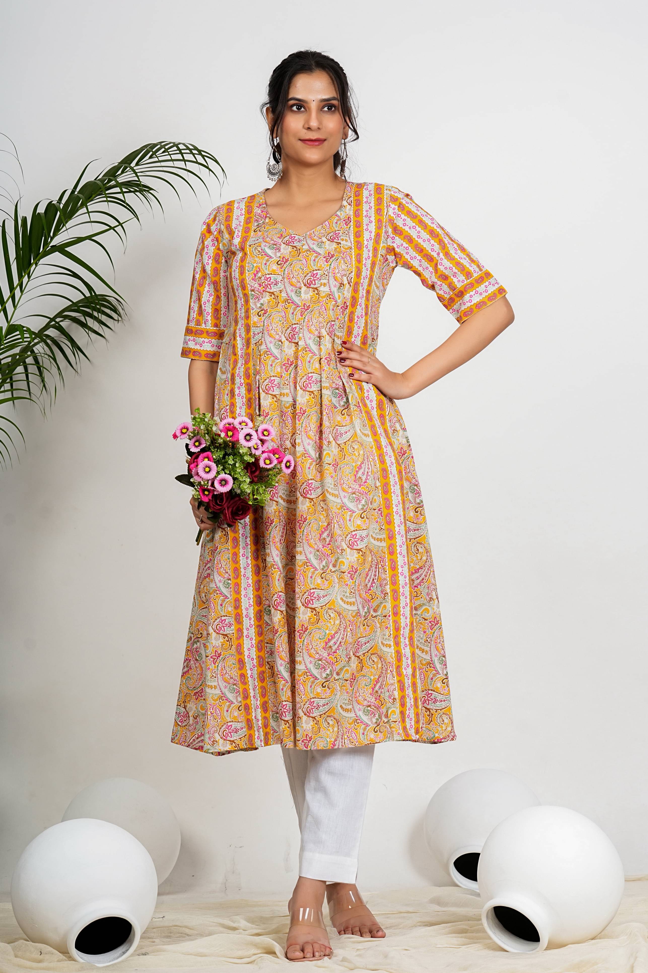 Vbuyz Pack of 1 Cotton Printed Flared Women's Kurti - ( Yellow )     			Vbuyz Pack of 1 Cotton Printed Flared Women's Kurti - ( Yellow )