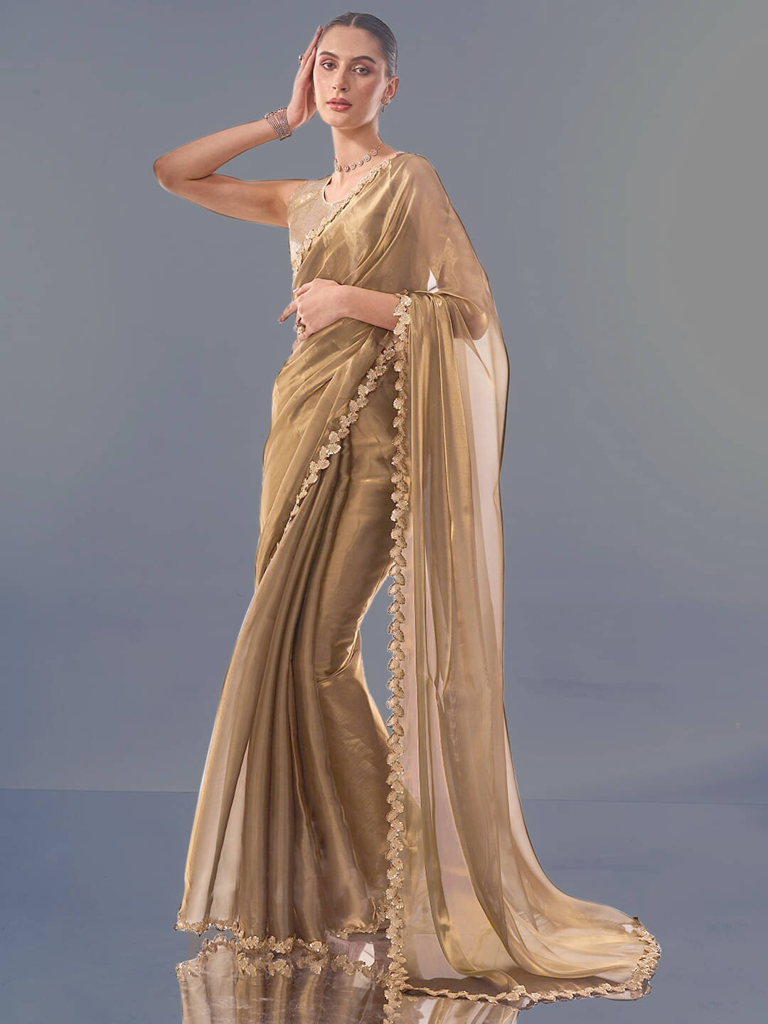 PHORIA STYLE Zimmy Choo Embroidered Saree With Unstitched Blouse Piece ( Bronze ) PHORIA STYLE Zimmy Choo Embroidered Saree With Unstitched Blouse Piece ( Bronze )