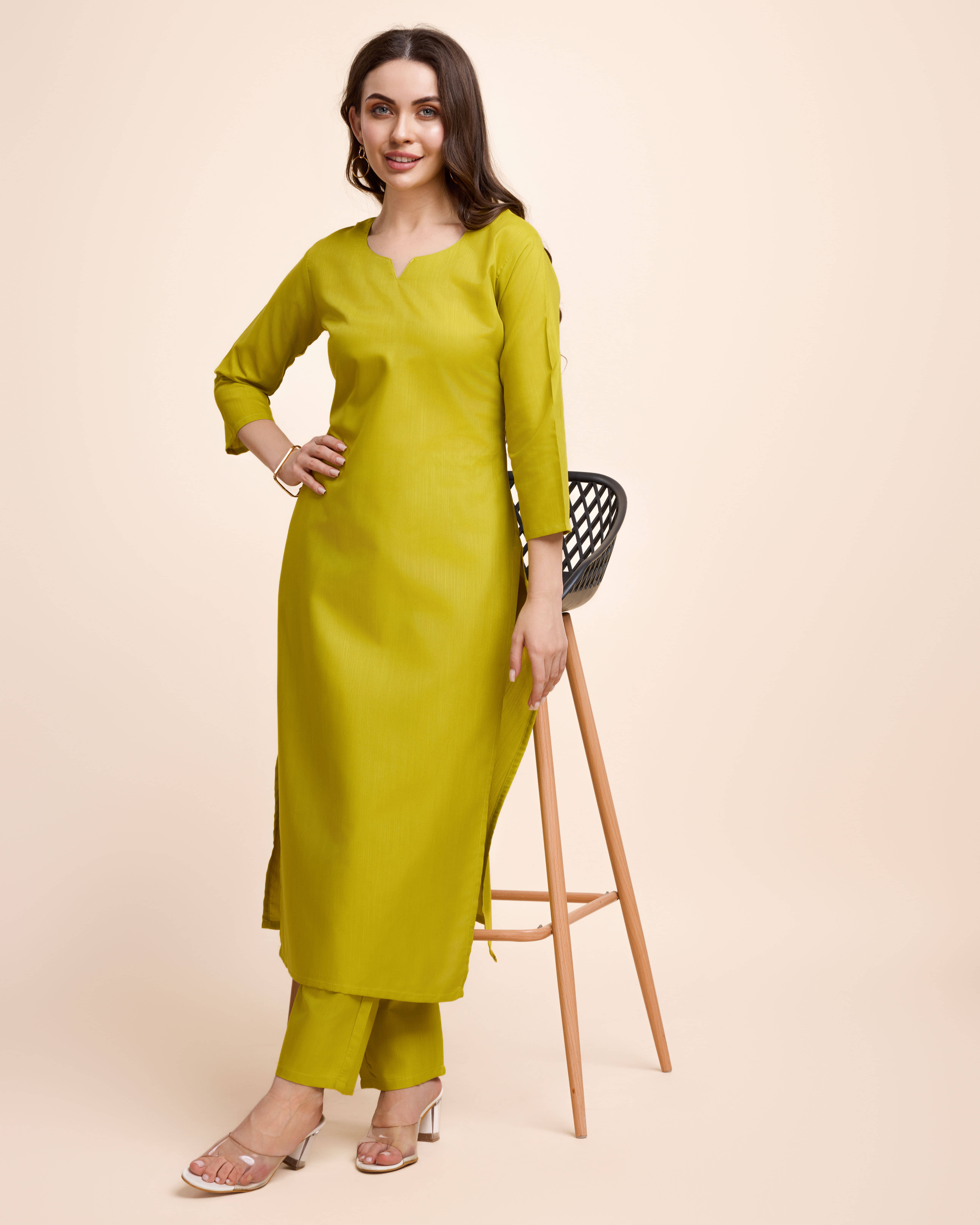 Women Basket Cotton Blend Solid Kurti With Pants Women's Stitched Salwar Suit - Yellow ( Pack of 1 )