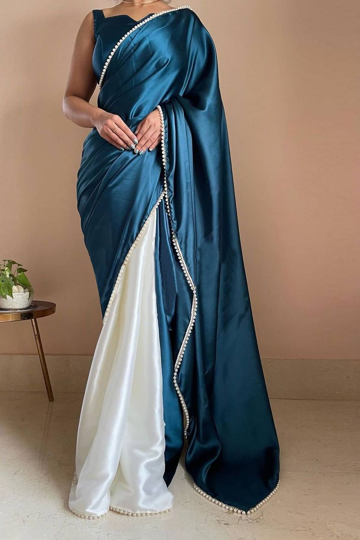 Apnisha Satin Embellished Saree With Unstitched Blouse Piece ( Teal ) Apnisha Satin Embellished Saree With Unstitched Blouse Piece ( Teal )